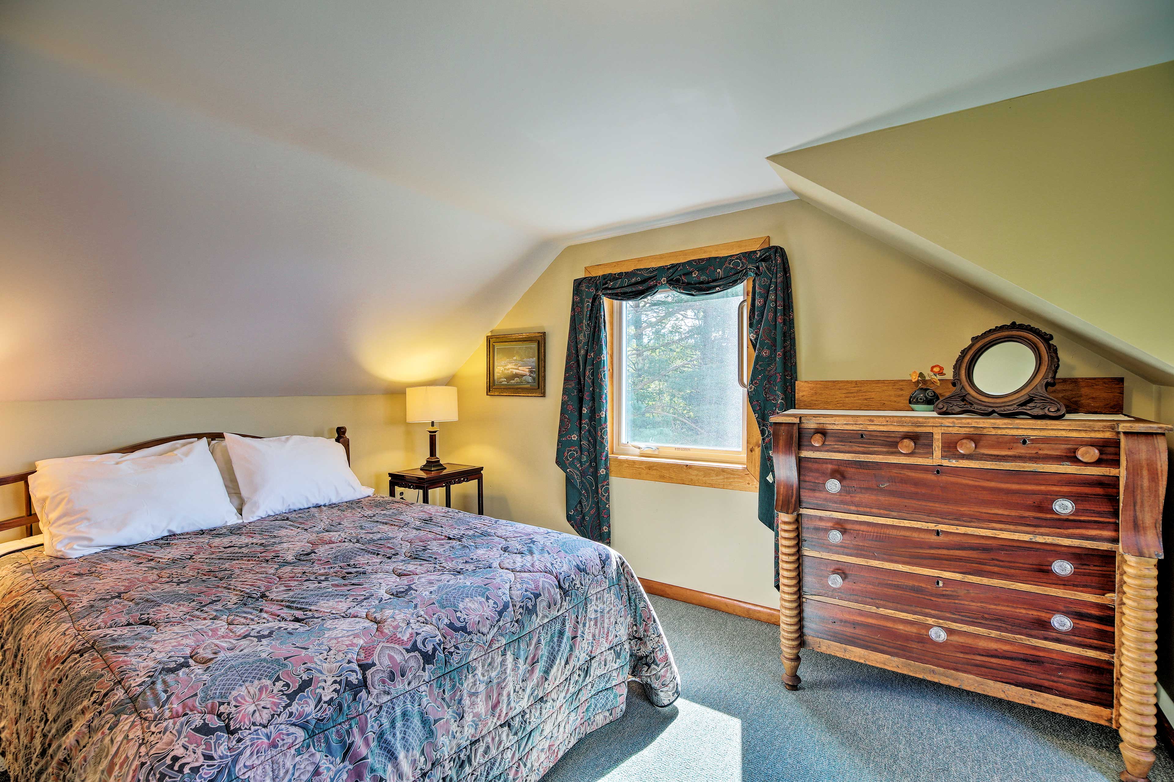 The sixth and final bedroom of the main house sleeps 2 in a queen bed.