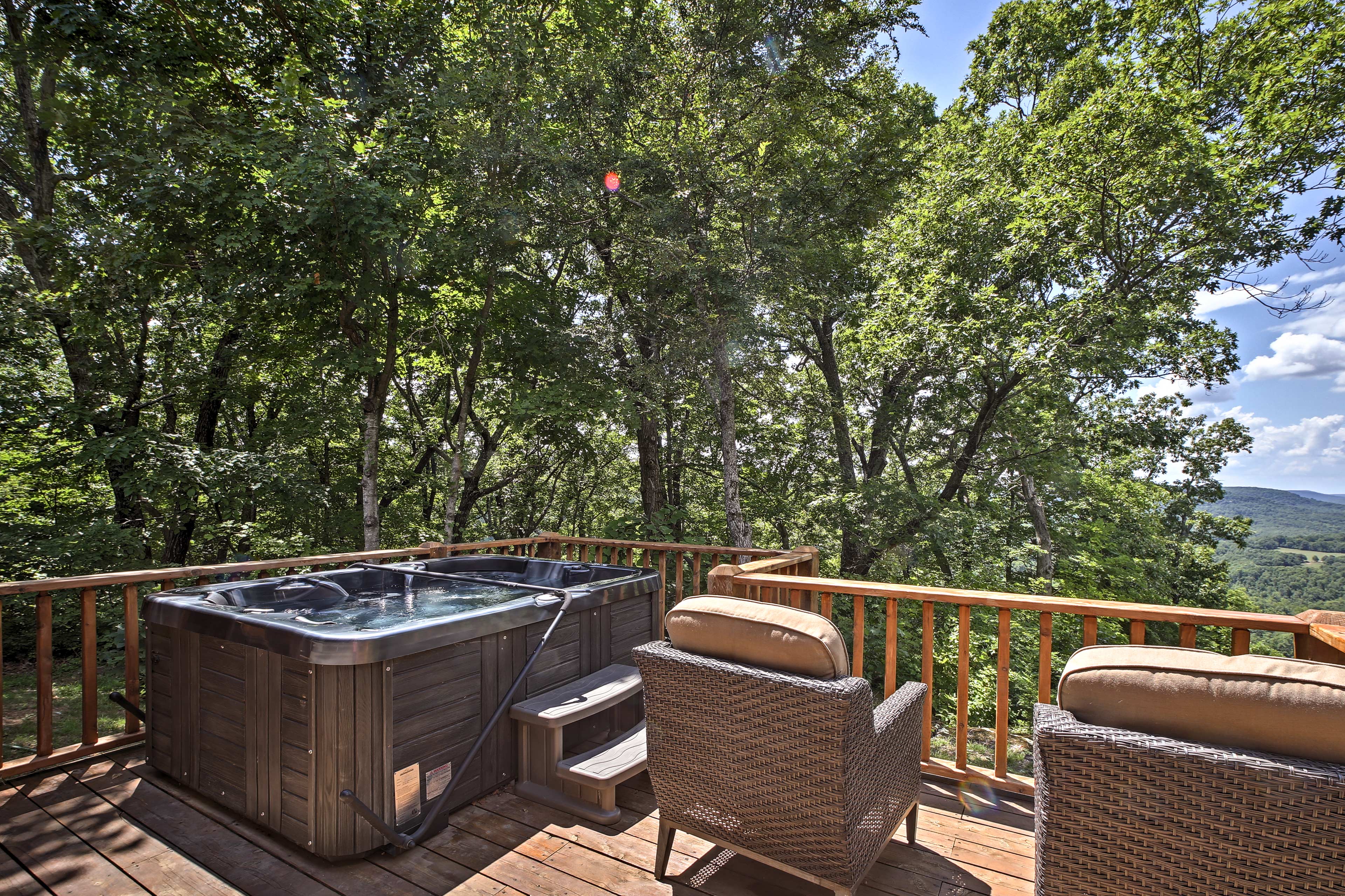 You'll have a beautiful interior, outdoor living spaces, and a private hot tub.