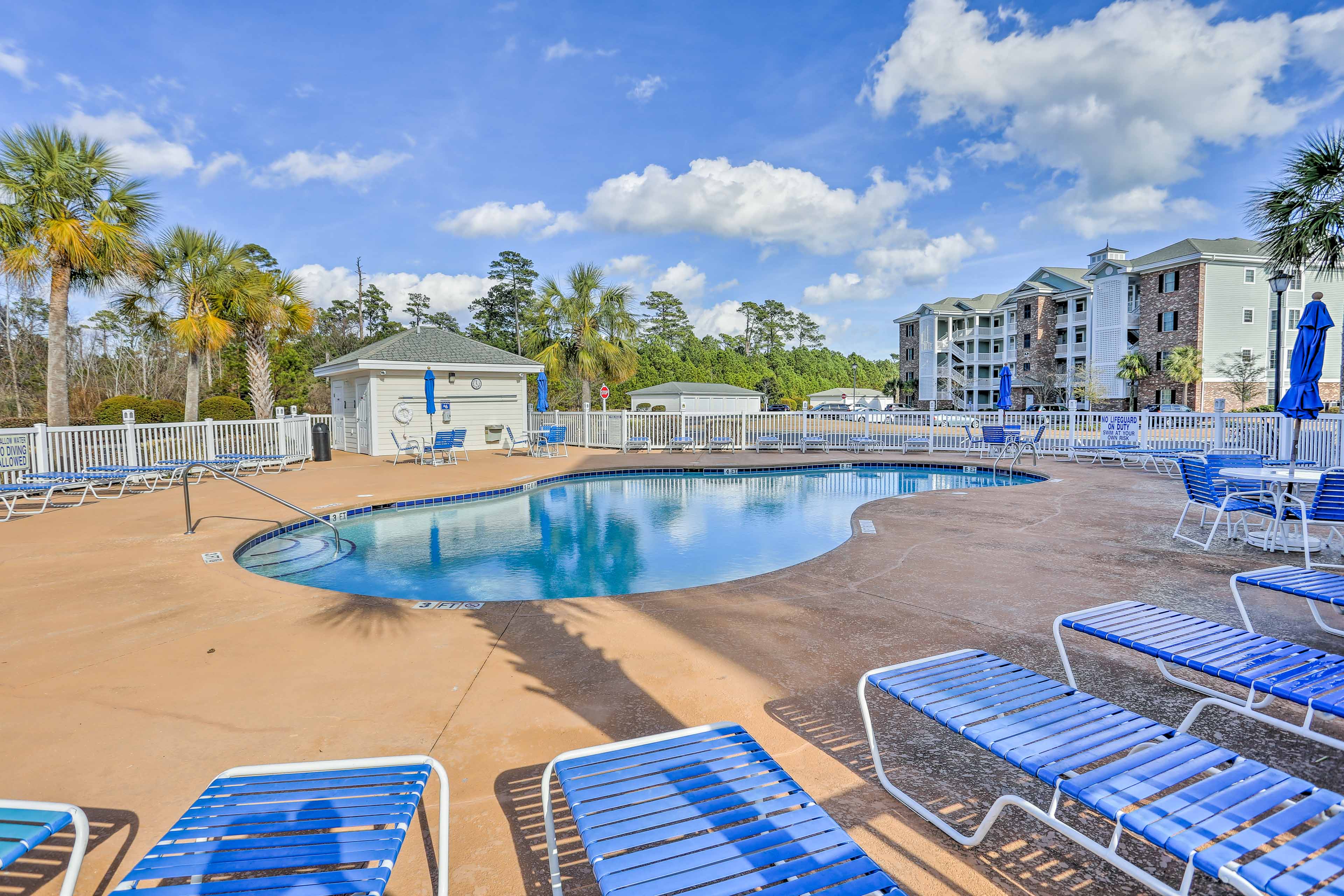 Spend leisurely days basking by the community pool.