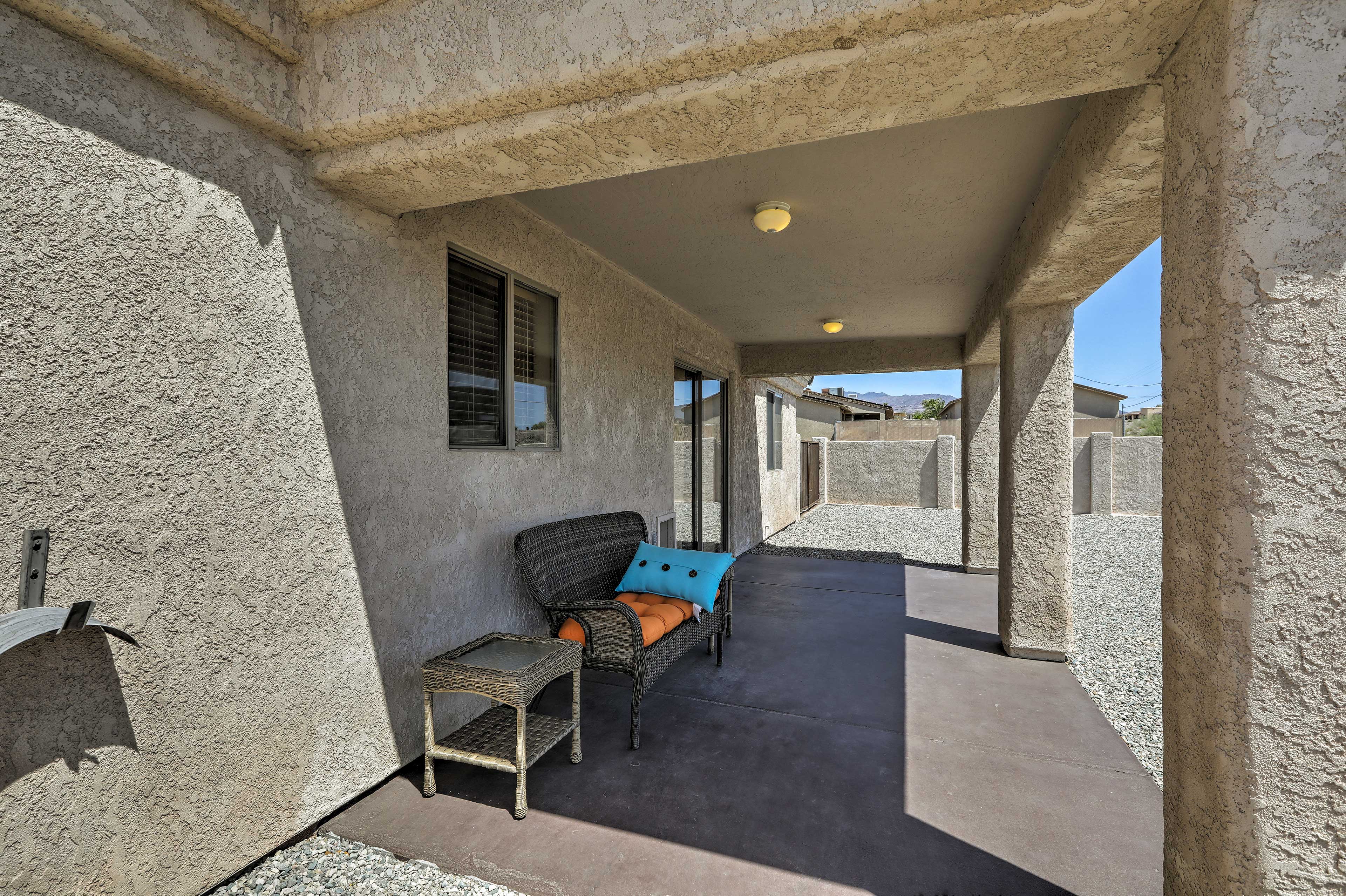 Exterior | Covered Patio & Spacious Yard