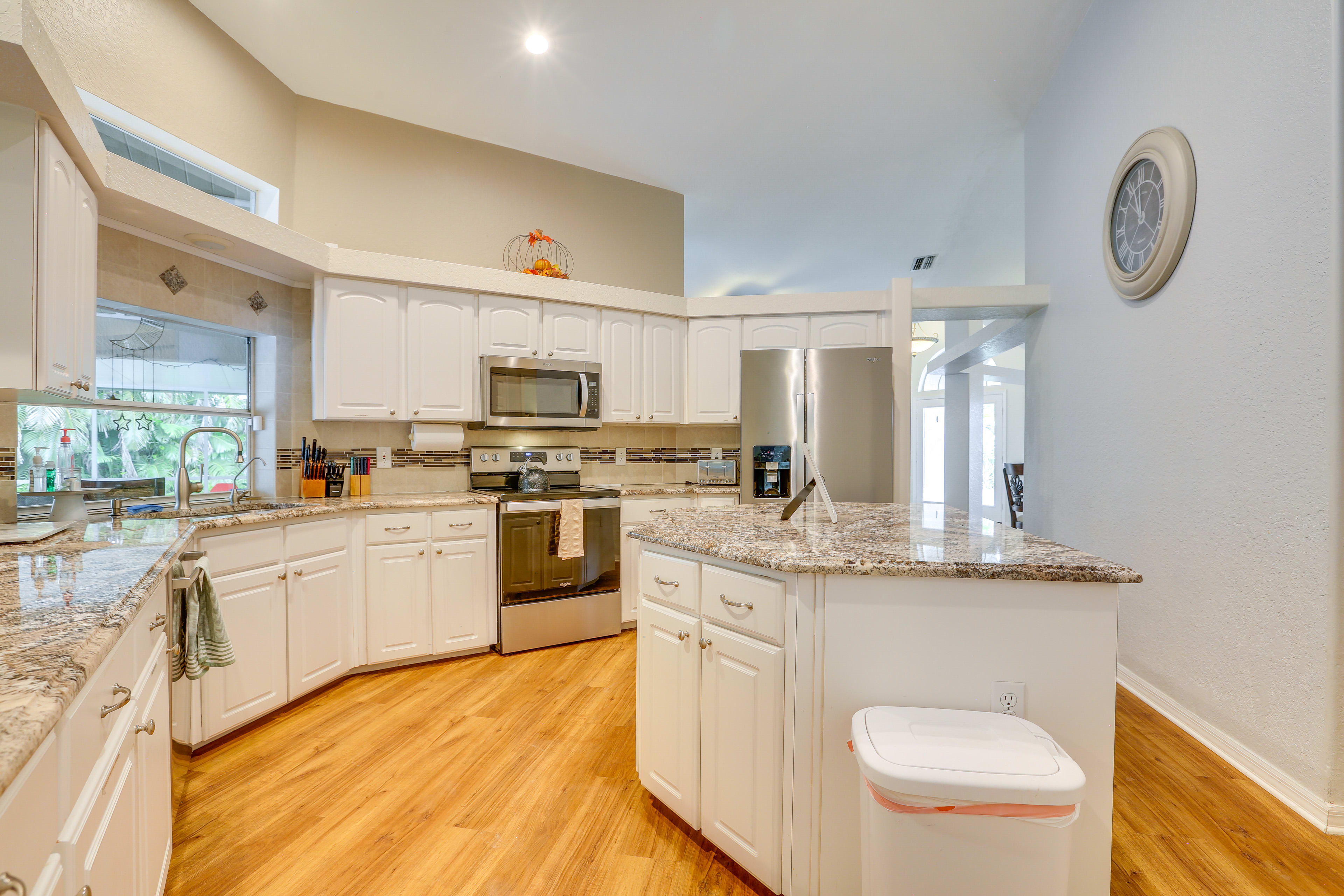 Kitchen | Granite Countertops | Drip Coffee Maker | Dishwasher | Tile Backsplash