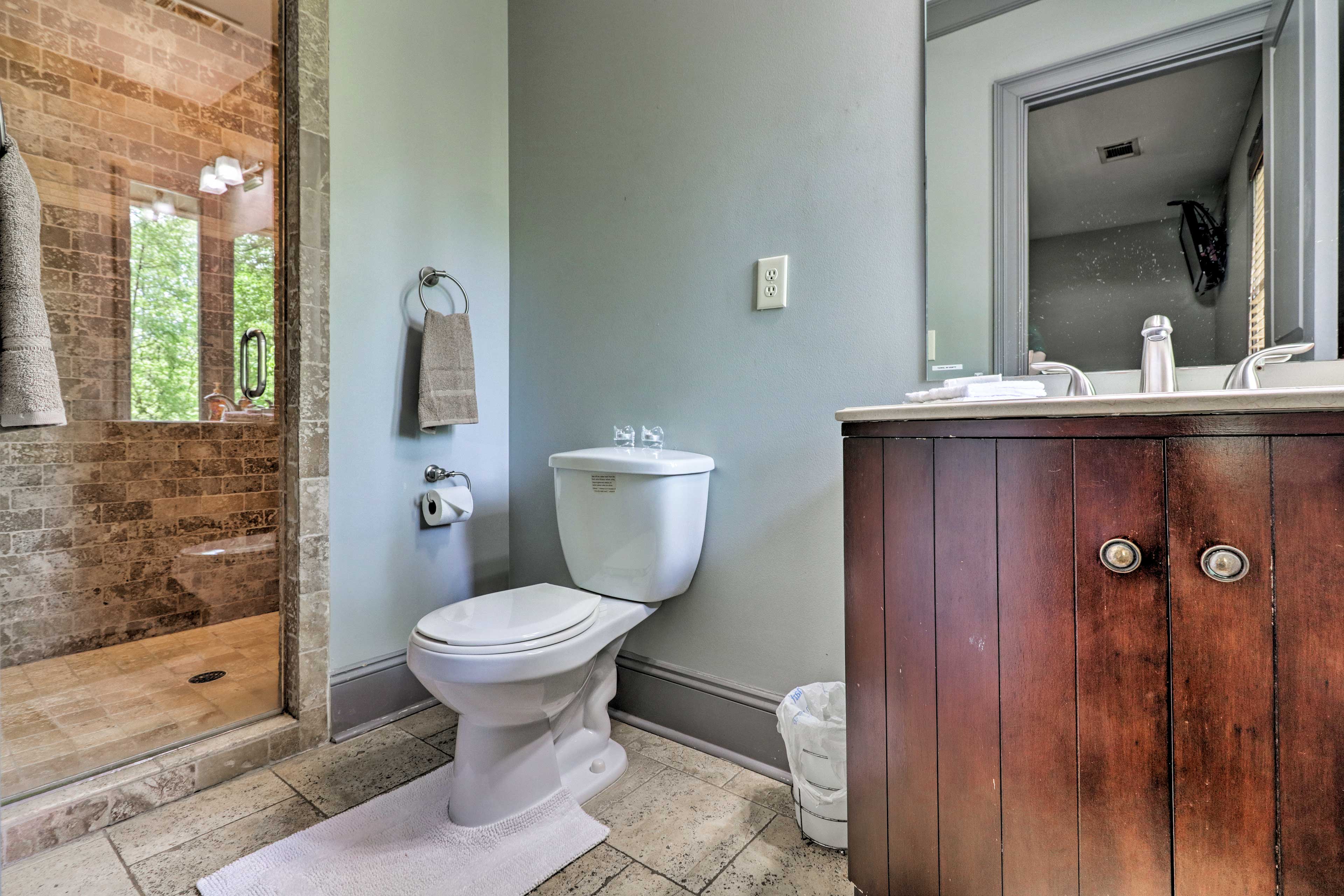 This bathroom features a walk-in shower.