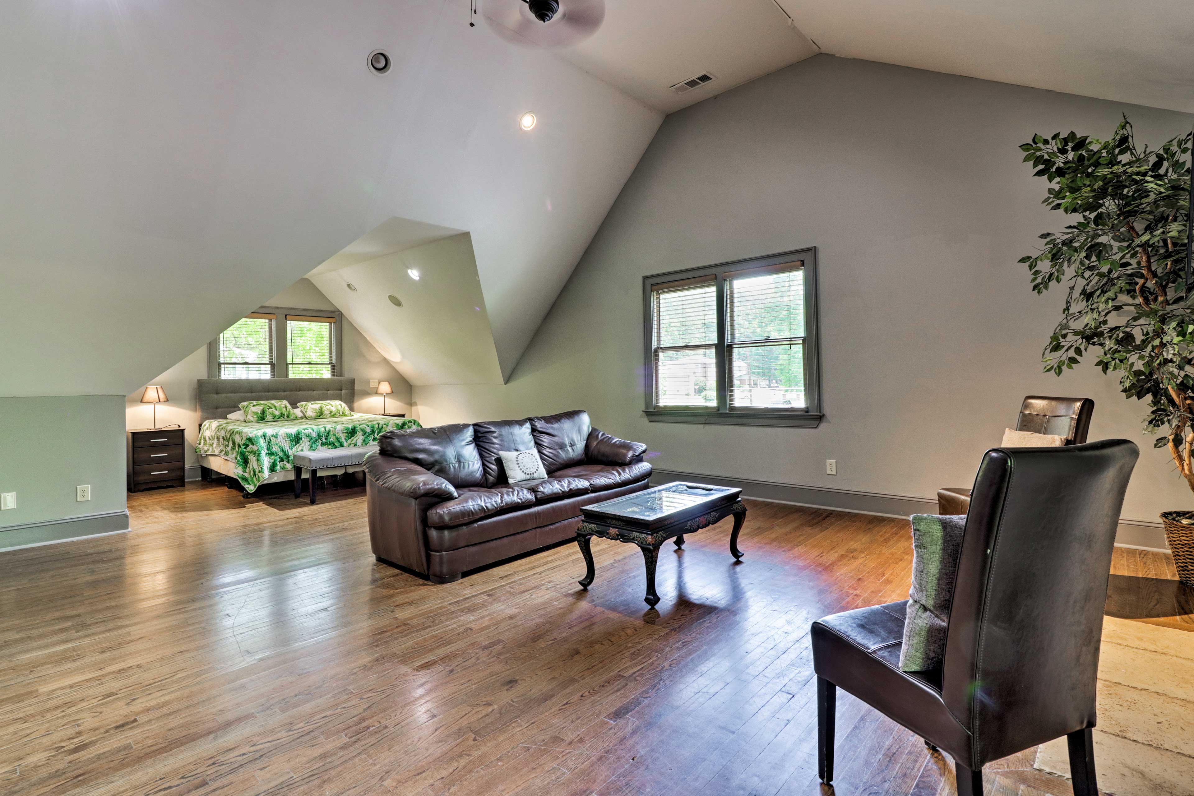 Call dibs on the spacious primary suite with 20-foot vaulted ceilings.