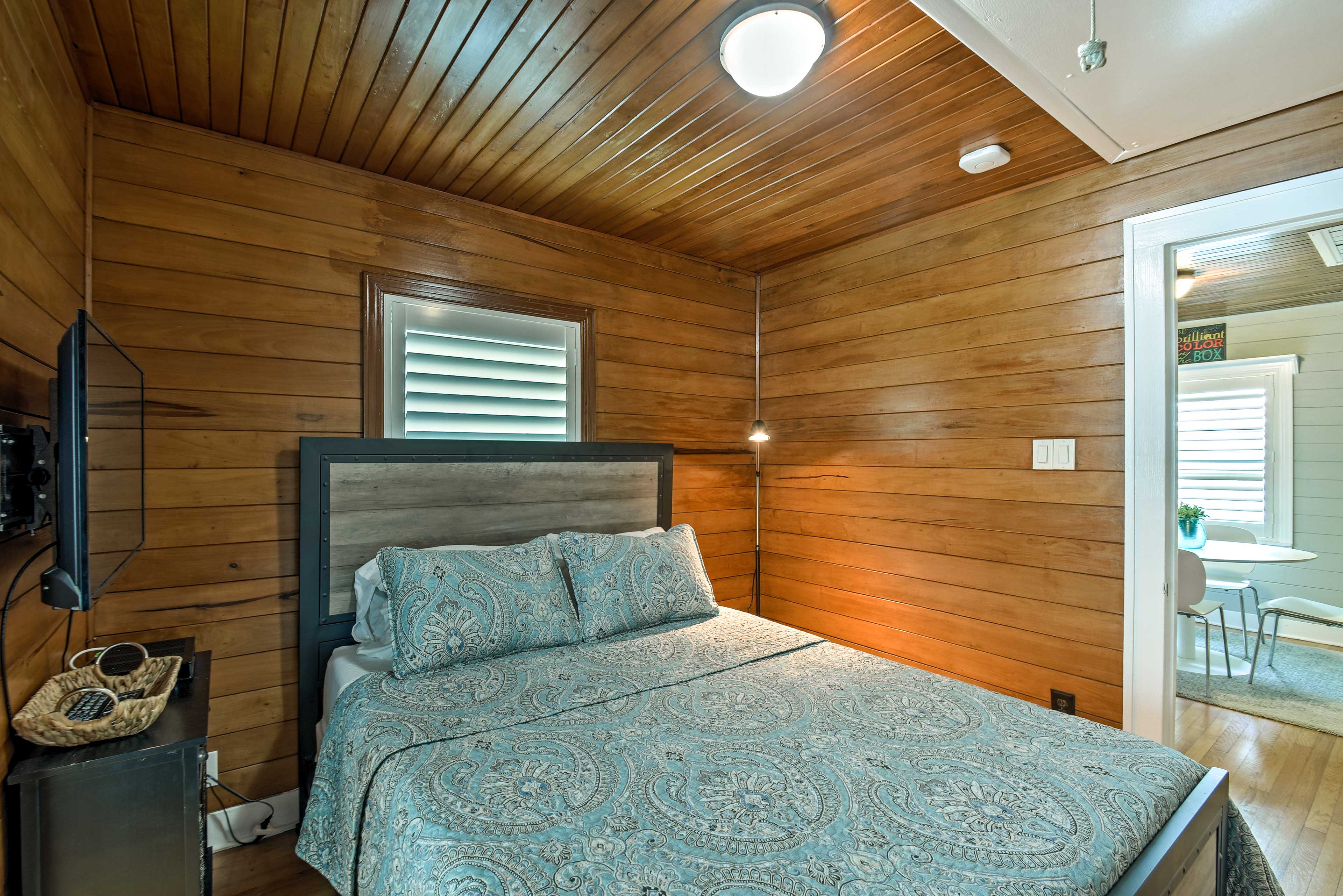 Sleep peacefully in this queen-sized bed.