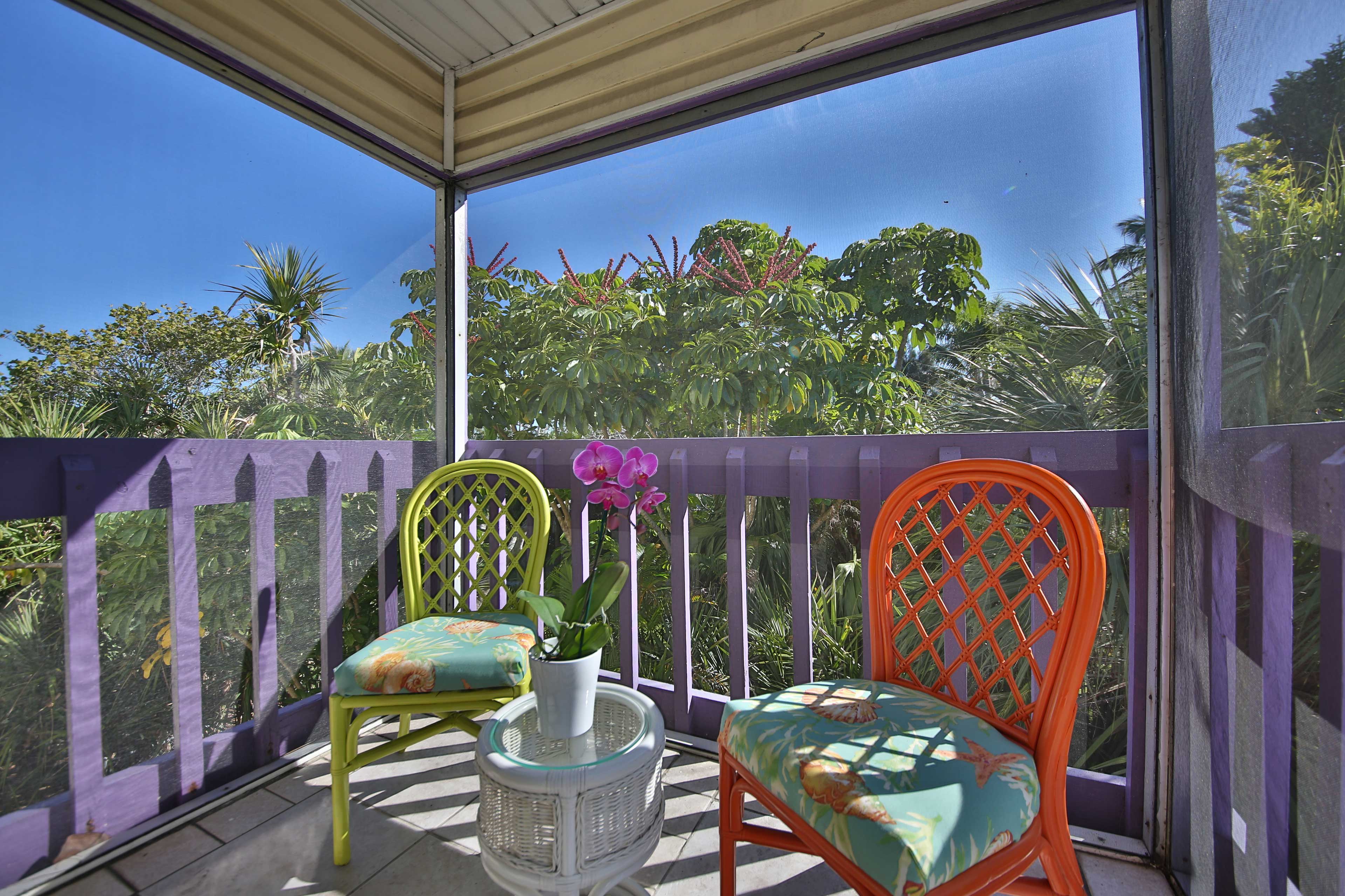 This private balcony whisks you away into your own tropical paradise!