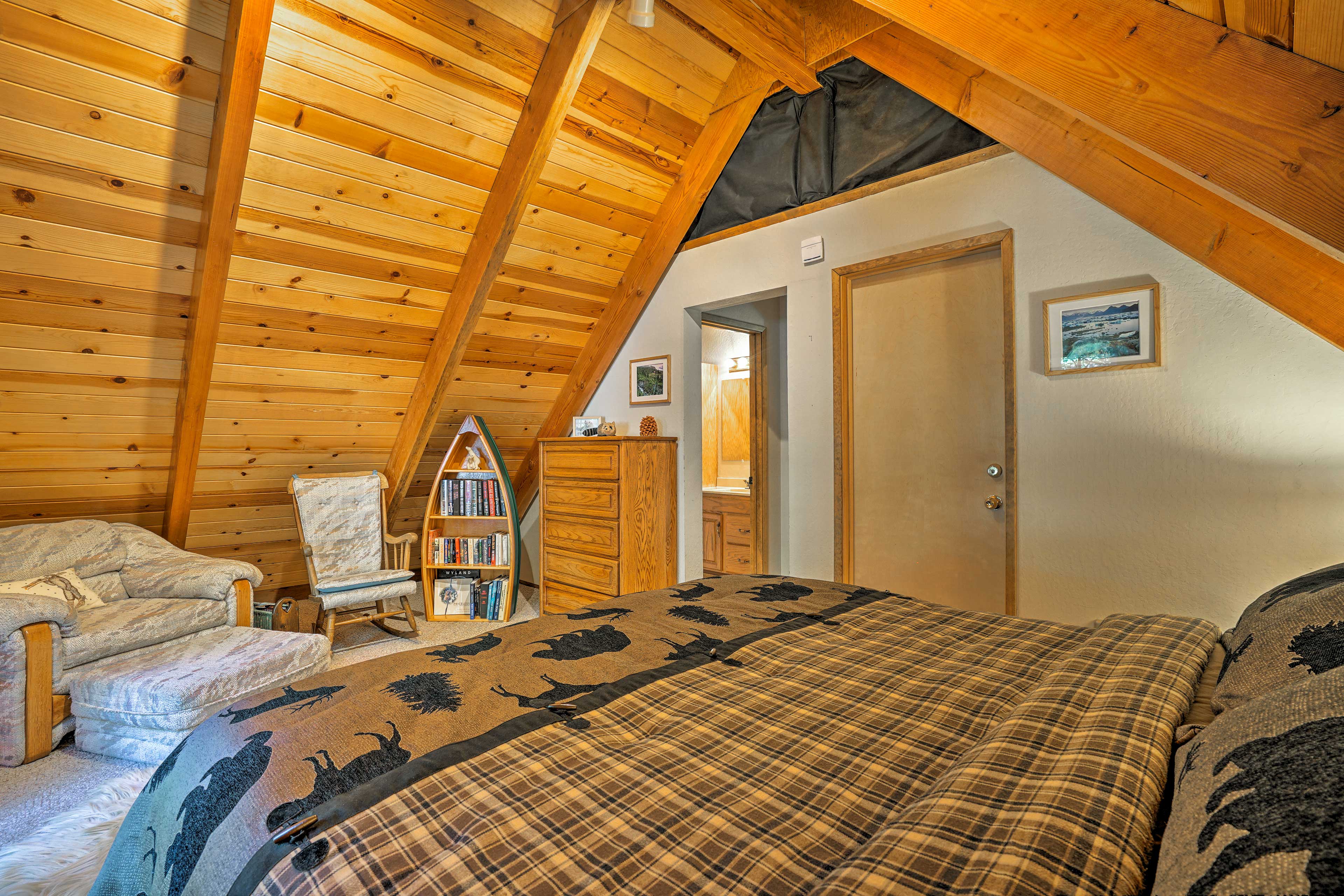 Guests of this bedroom will sleep peacefully in this king bed.