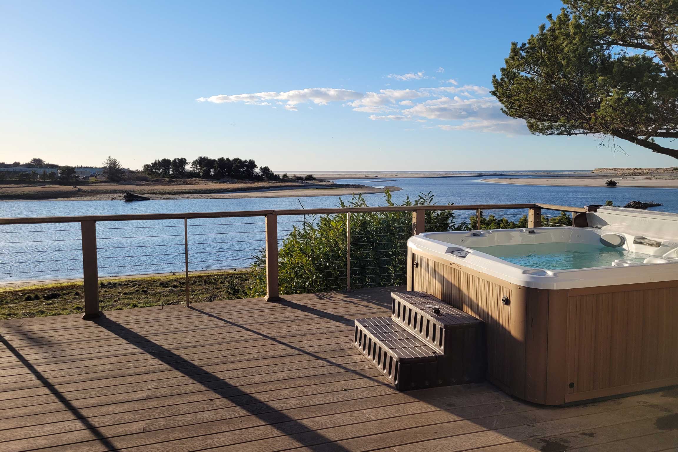 Private Deck | Hot Tub | Outdoor Dining Area | Outdoor Shower