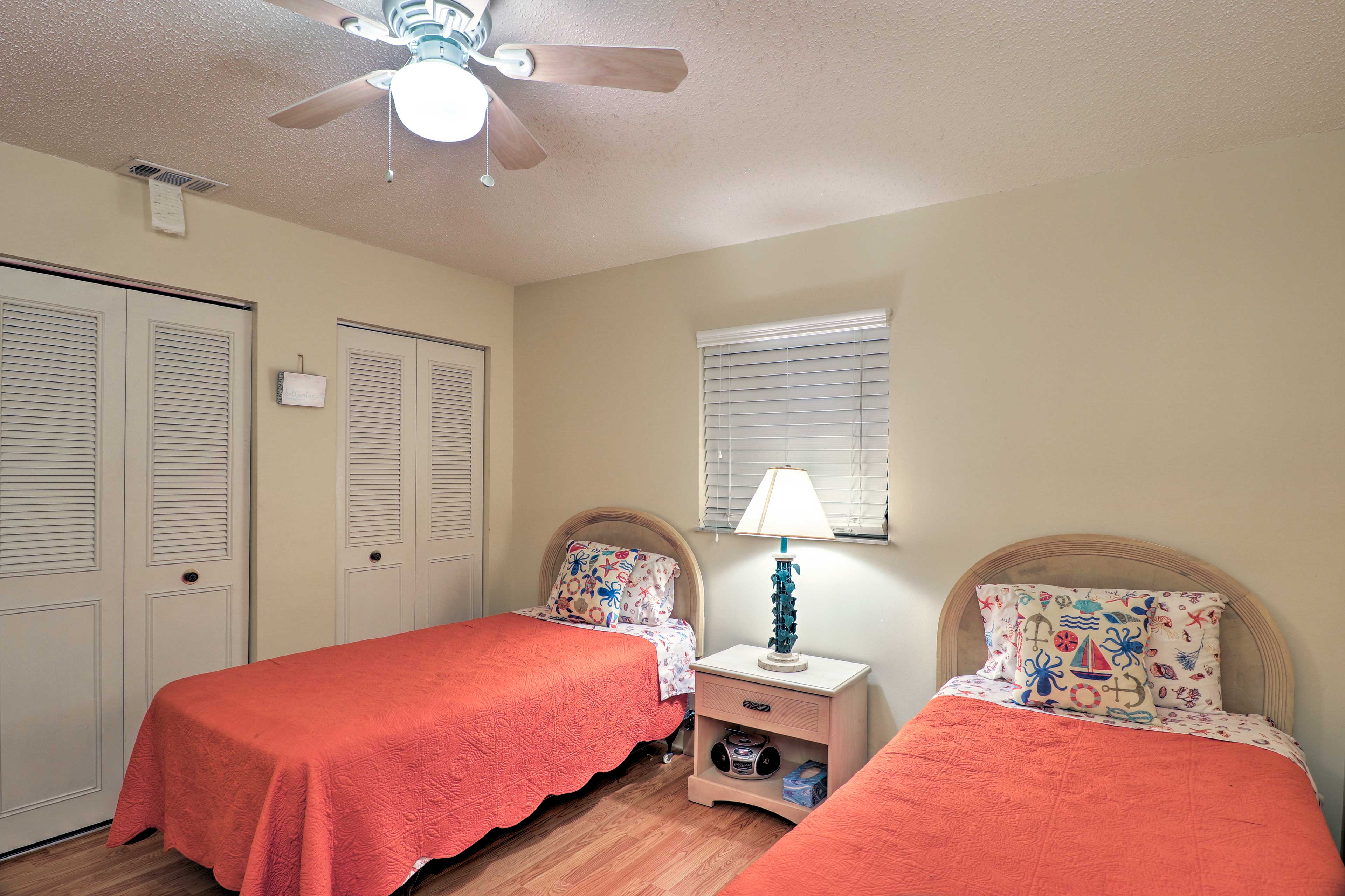 The second bedroom hosts 2 twin beds.