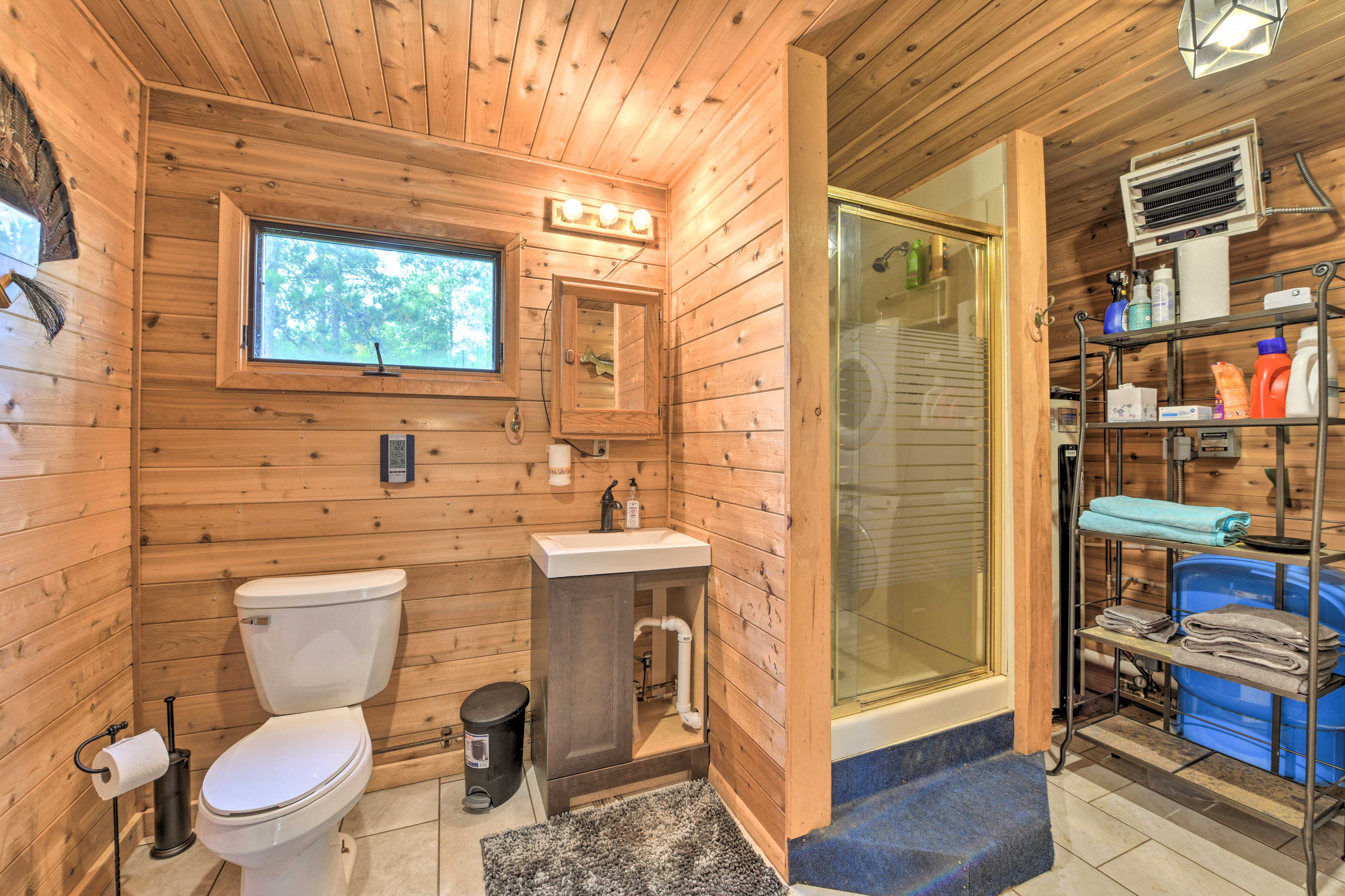 The bathroom in the bunkhouse boasts a Tongue & Groove interior.