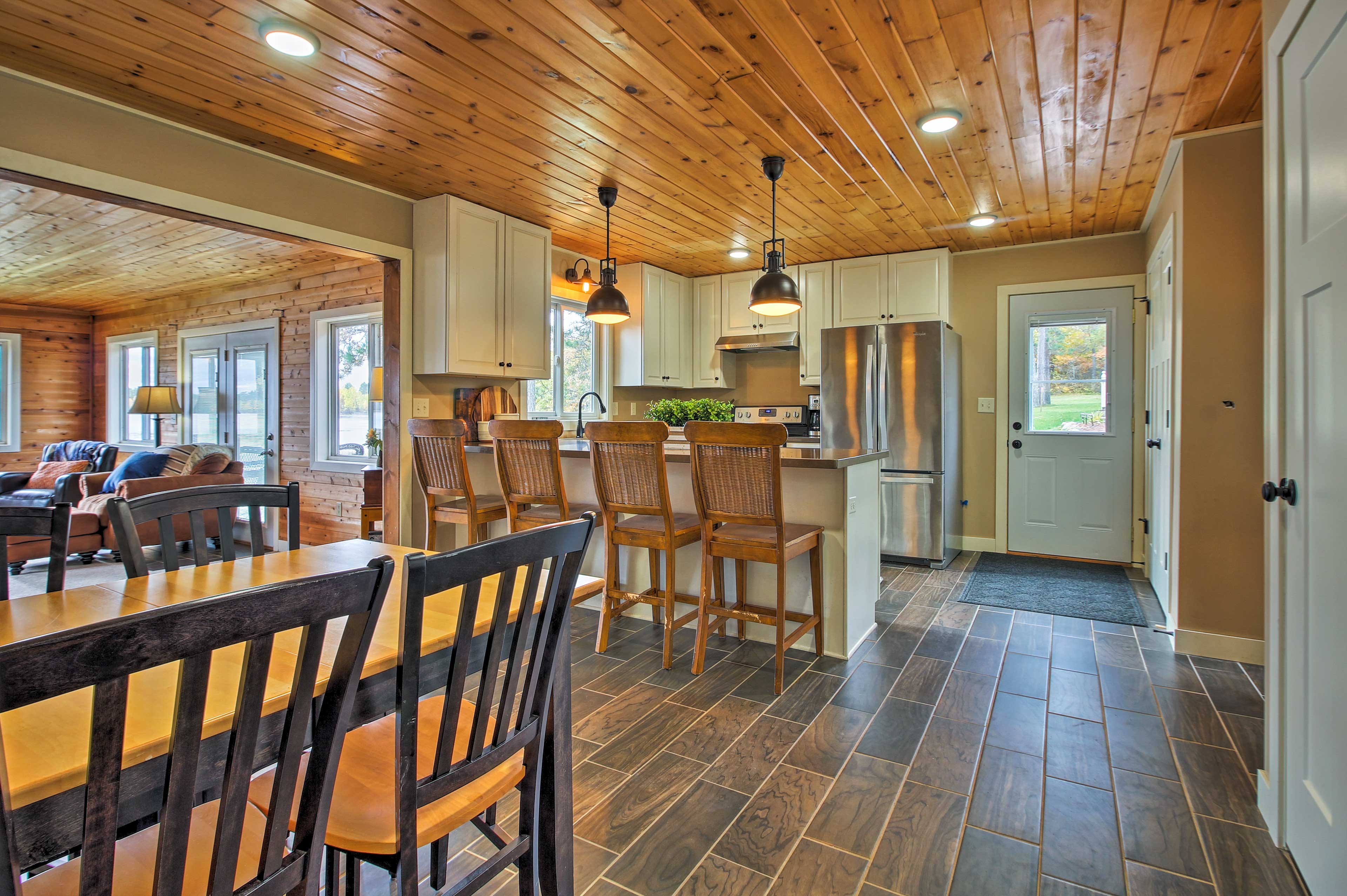 Pull up a chair to the breakfast bar to help with meal prep.