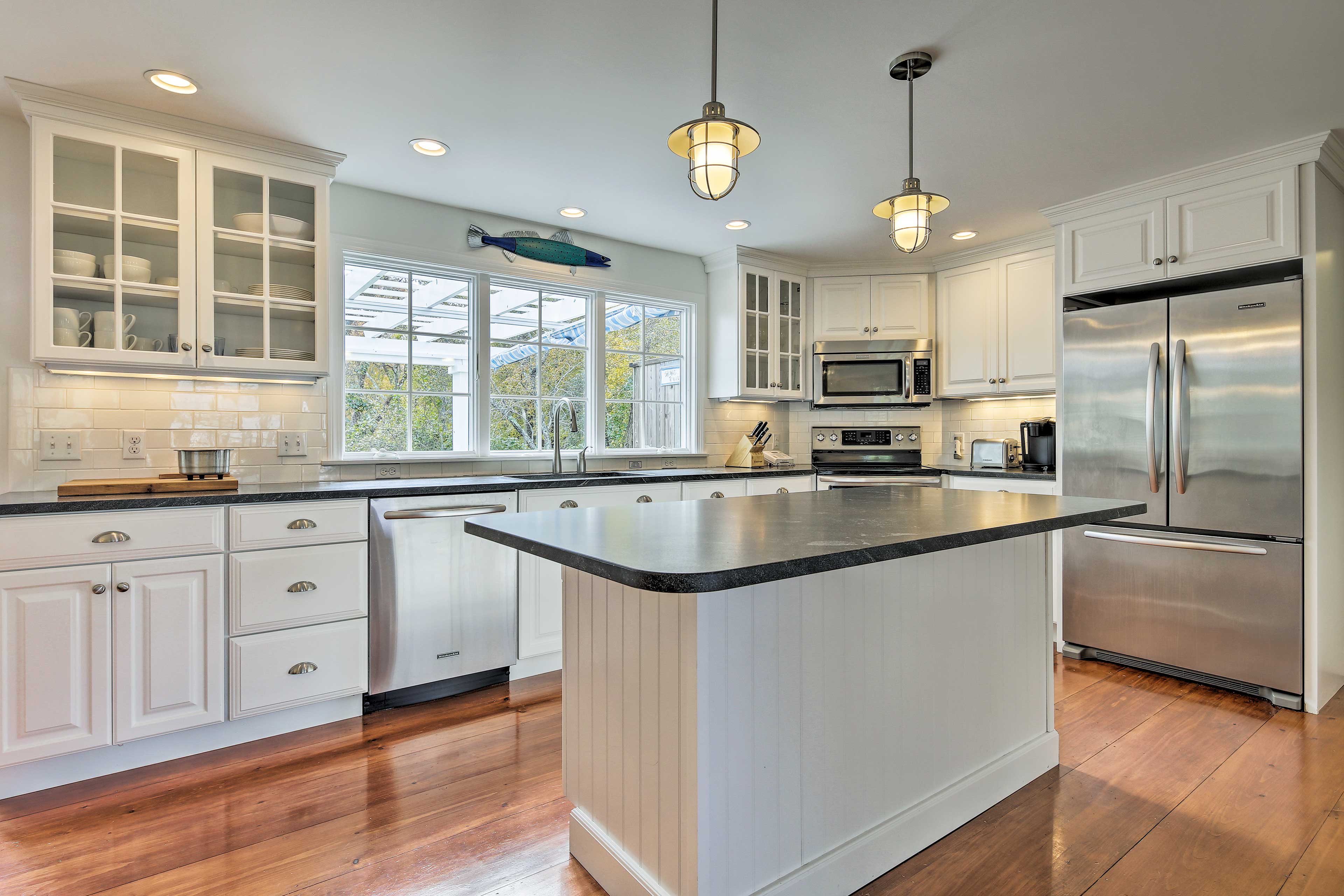 This newly renovated, high-end kitchen will make cooking easy & enjoyable.