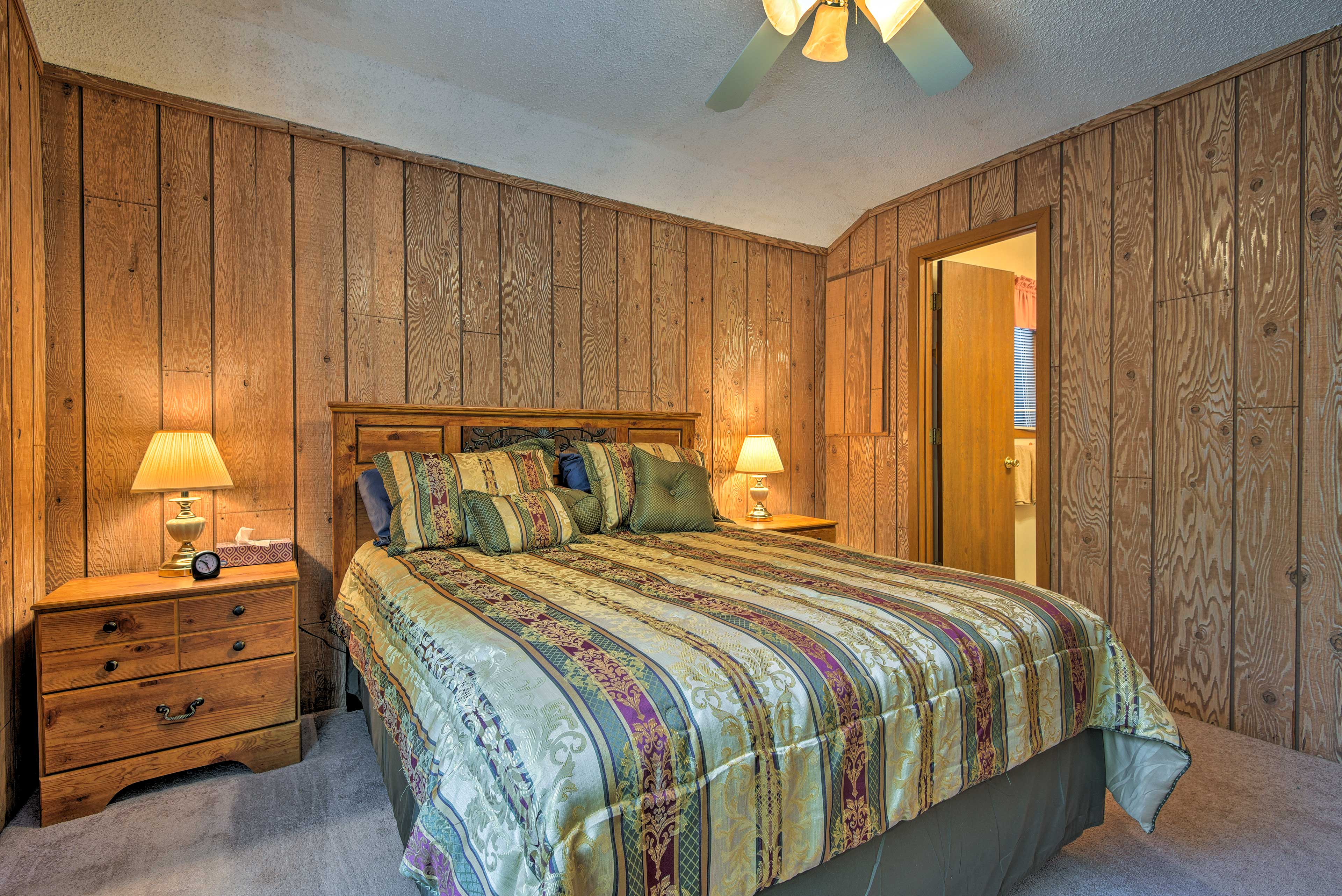 Two guests will sleep soundly in this queen bed.