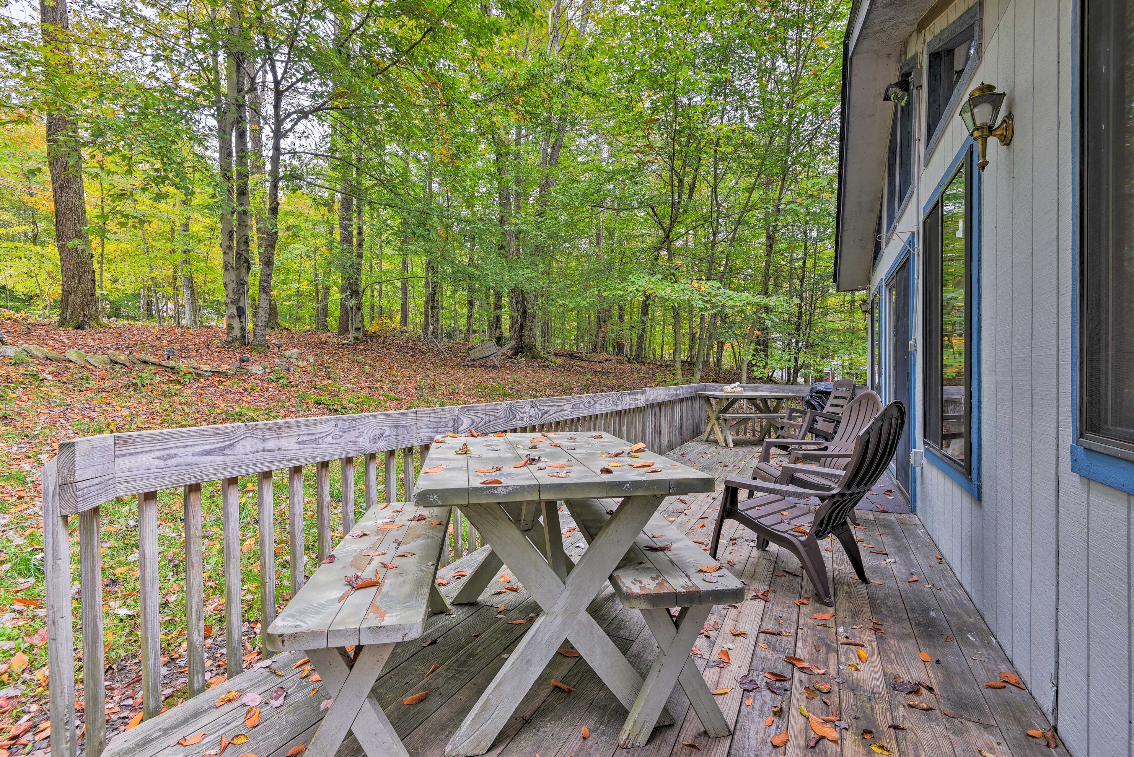 Views from the deck consist of the beautiful surrounding woodlands.