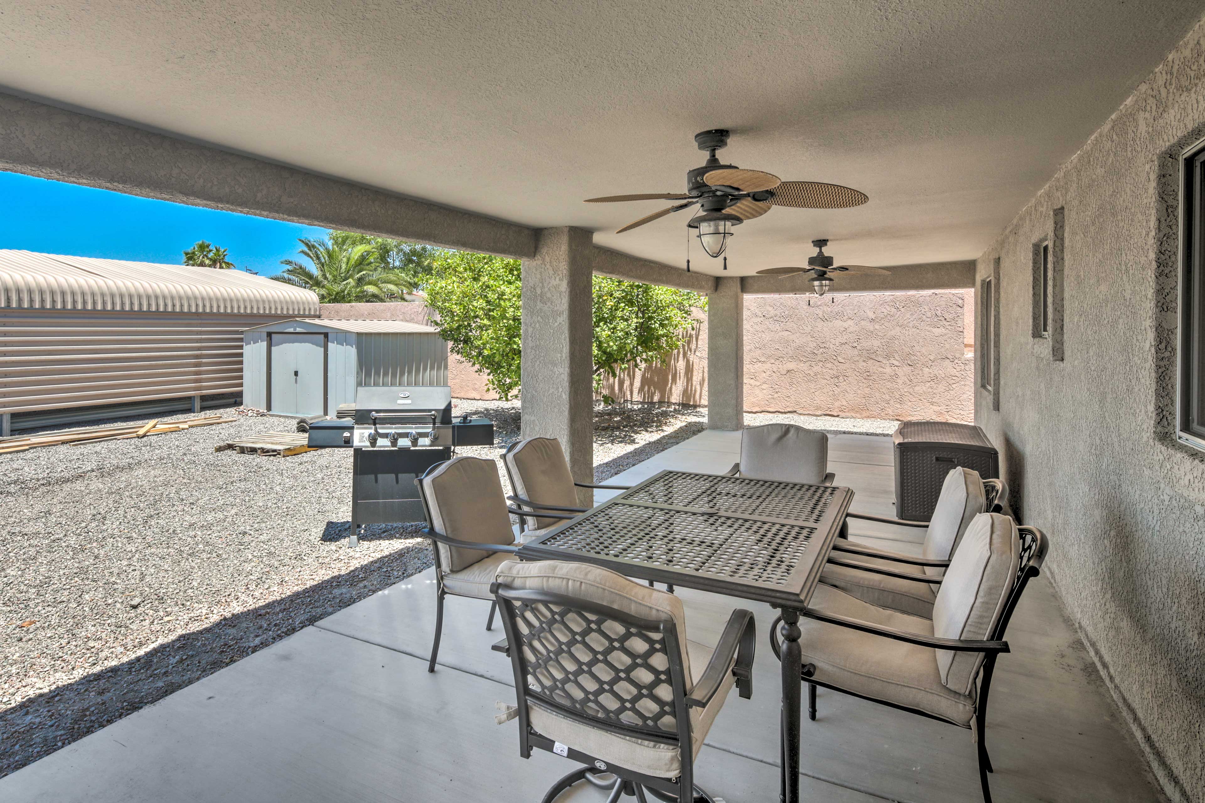 Gather for an outdoor meal at this dining set.