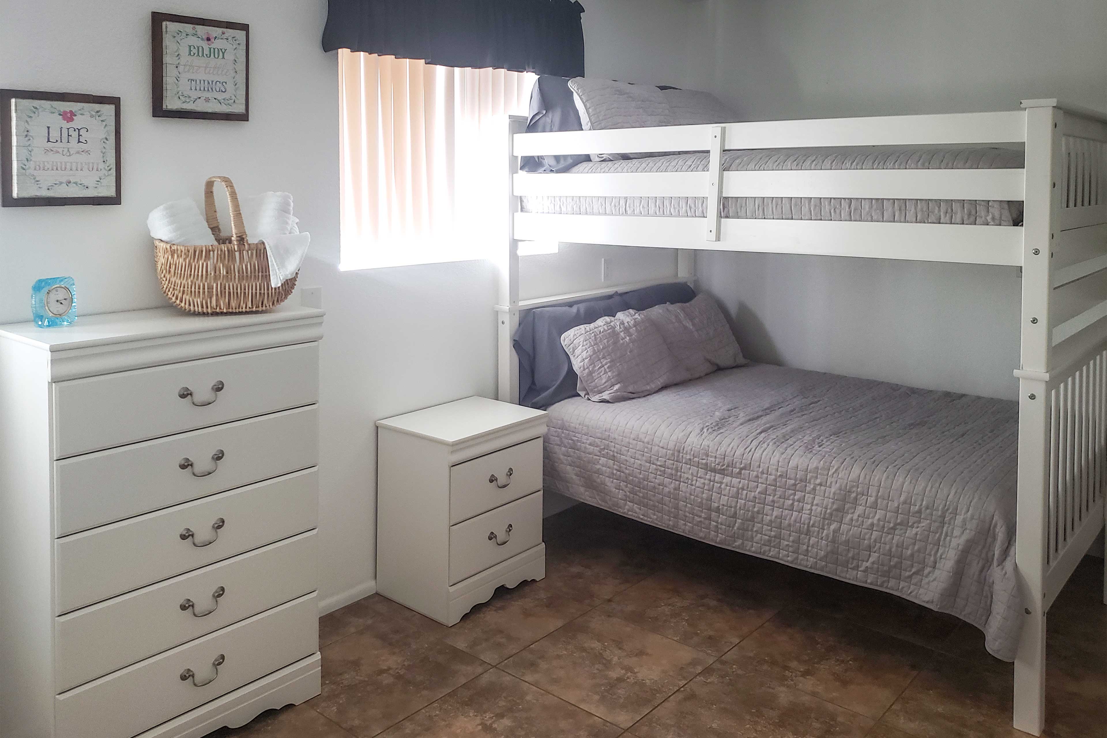 The third bedroom offers a full bunk bed and a queen bed.