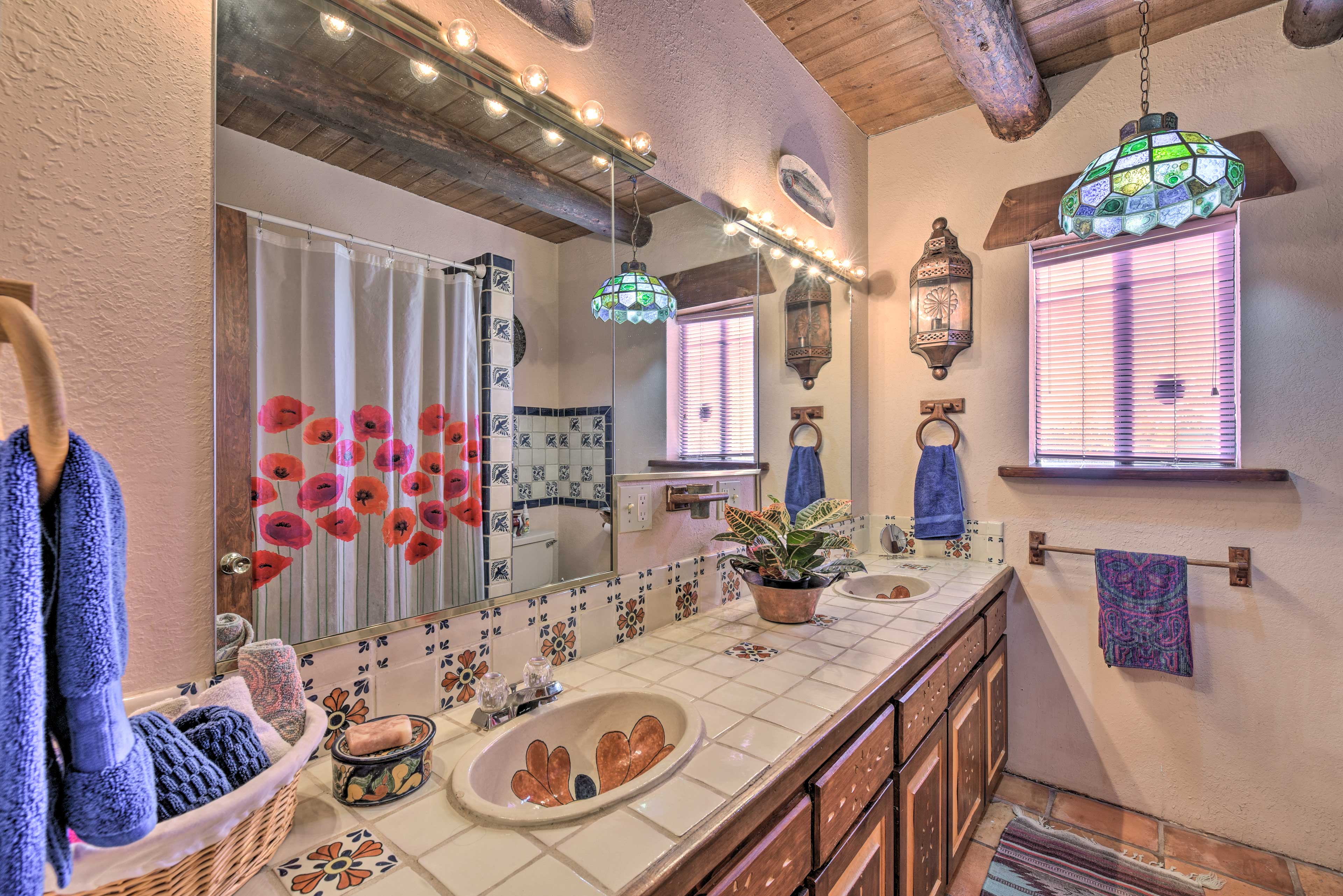 Rinse off the day in this spacious bathroom.