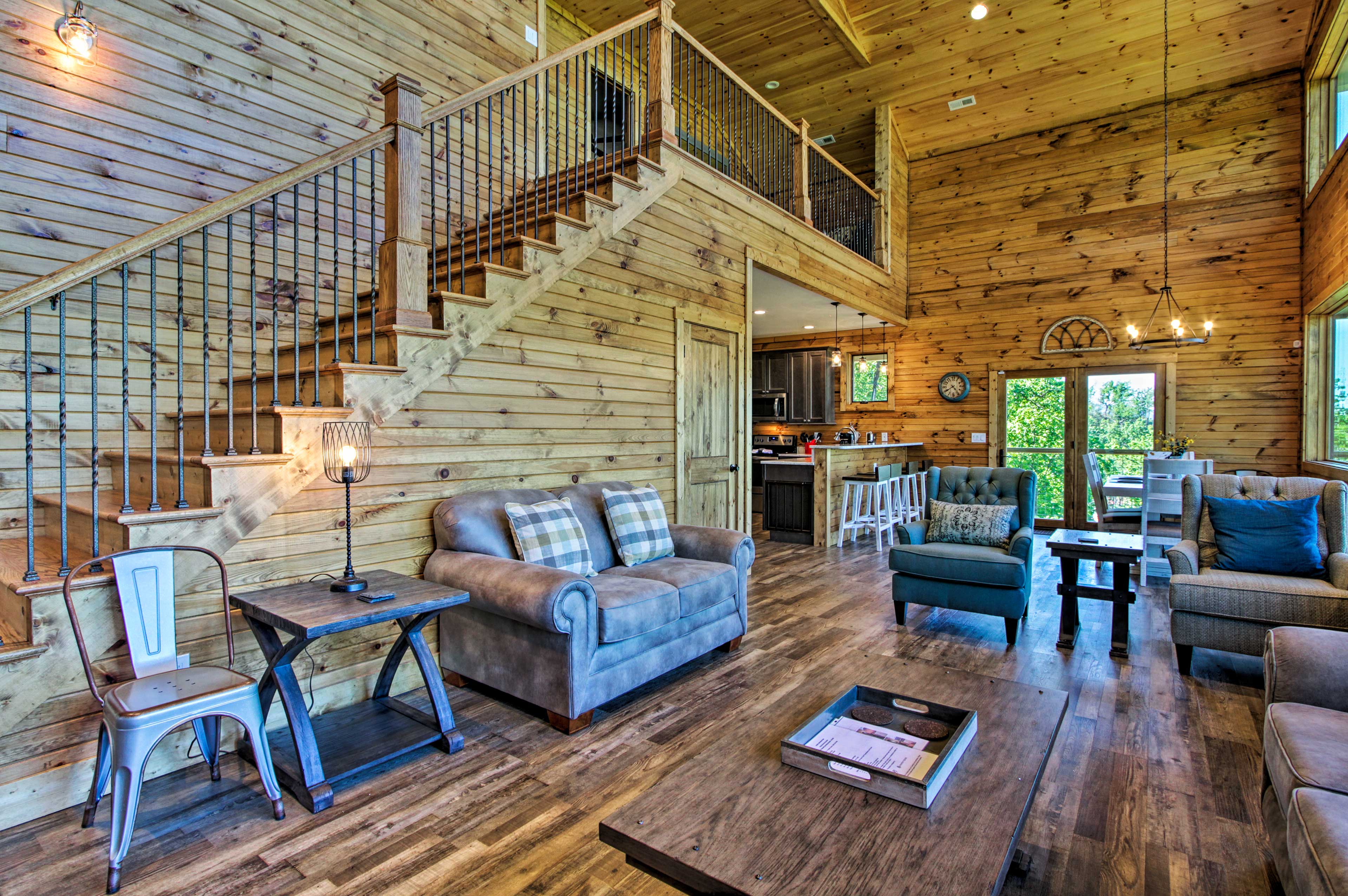 Floor-to-ceiling wood paneling brings the cabin to life.