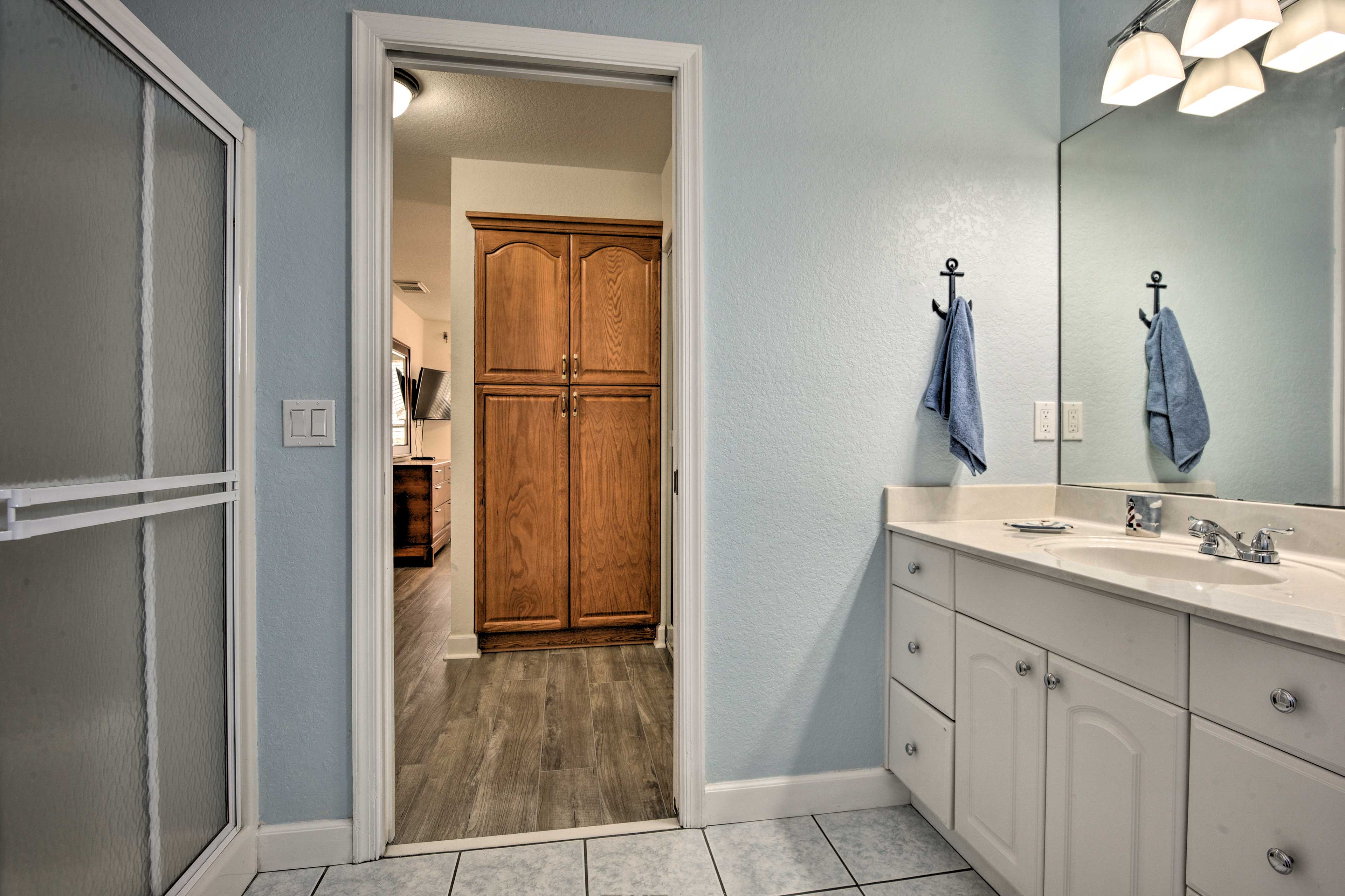The second bathroom includes a walk-in shower.