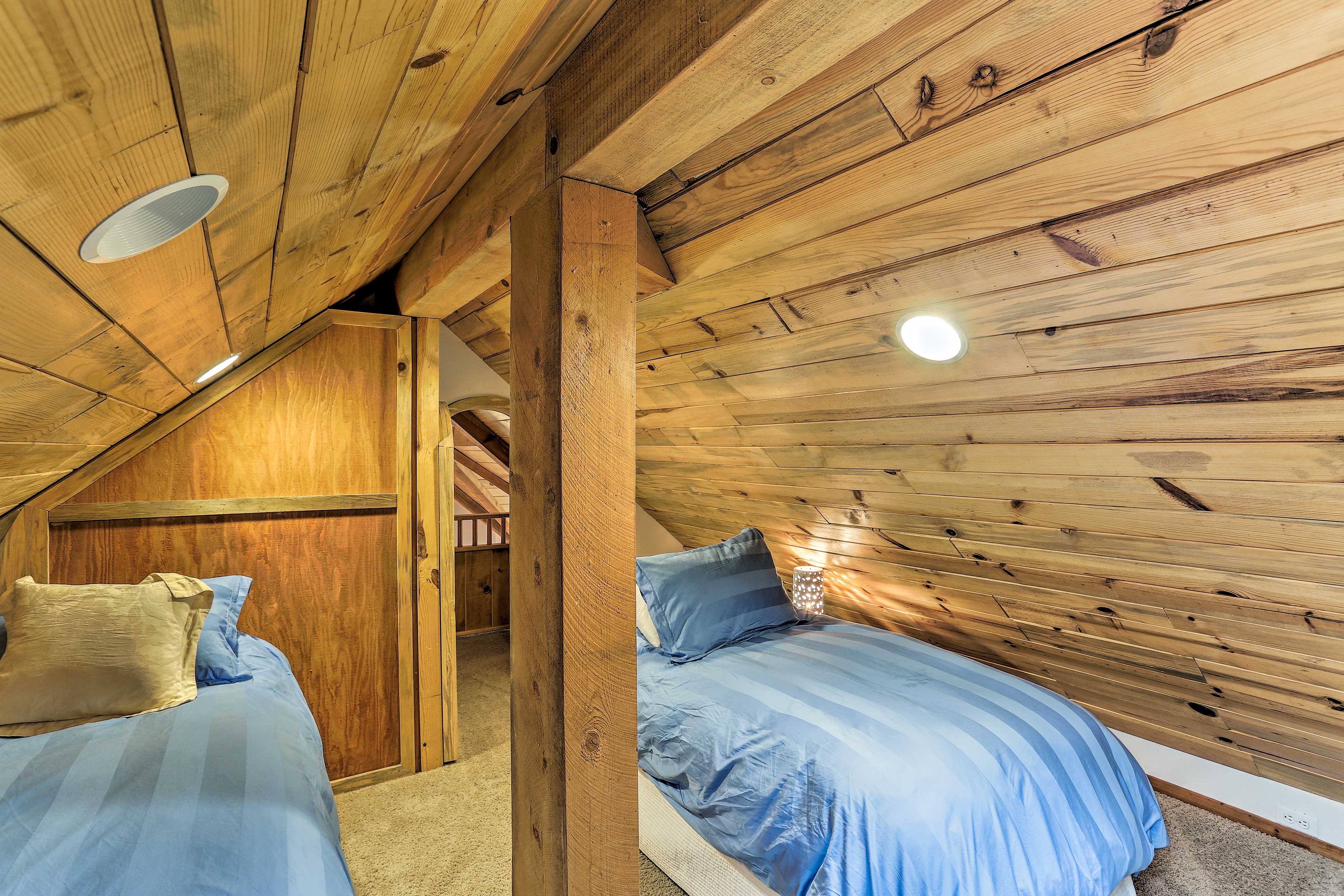 Your kids will love sleeping up here in 3 twin beds.
