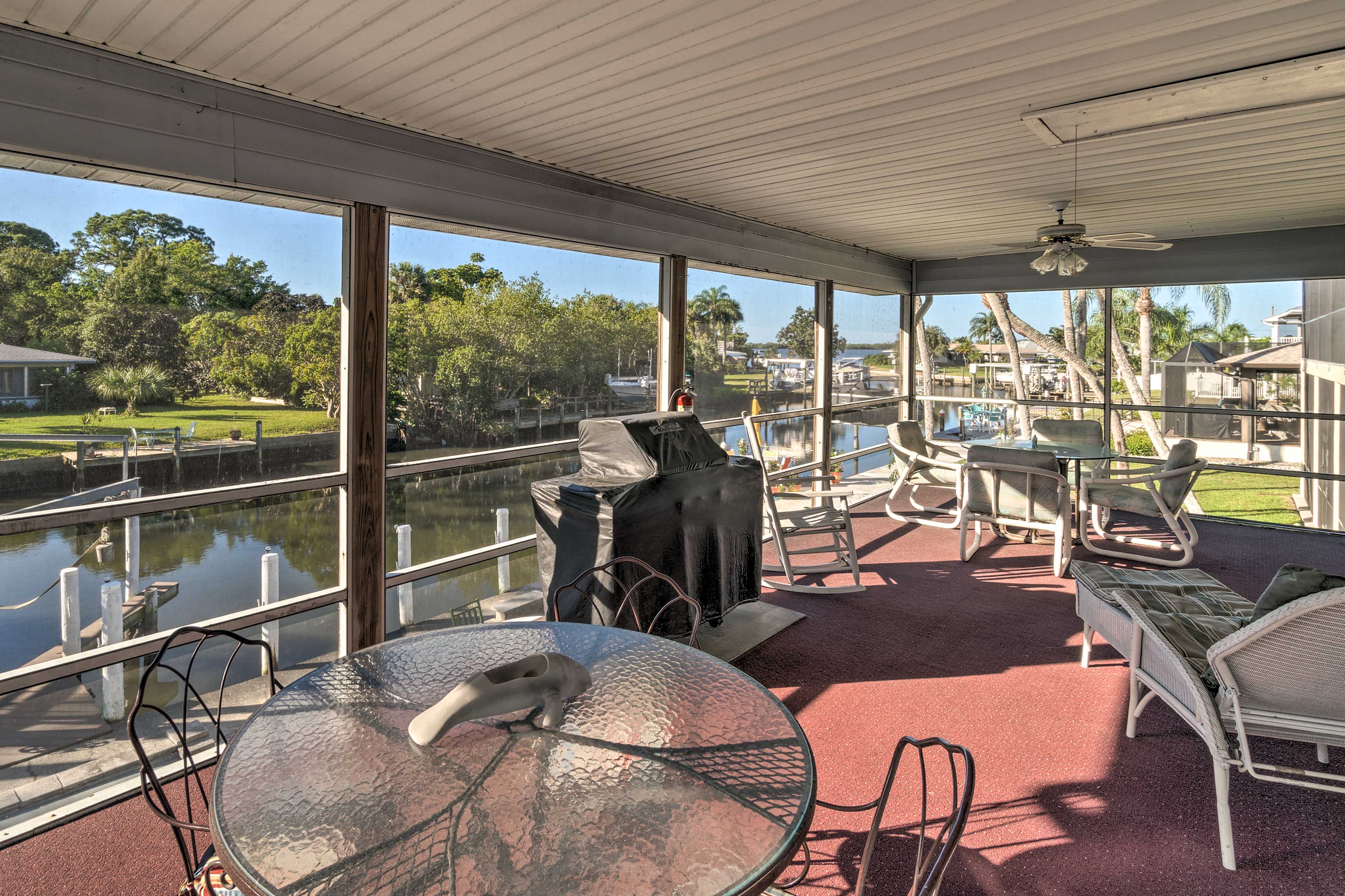 Dine with a view on the screened porch.