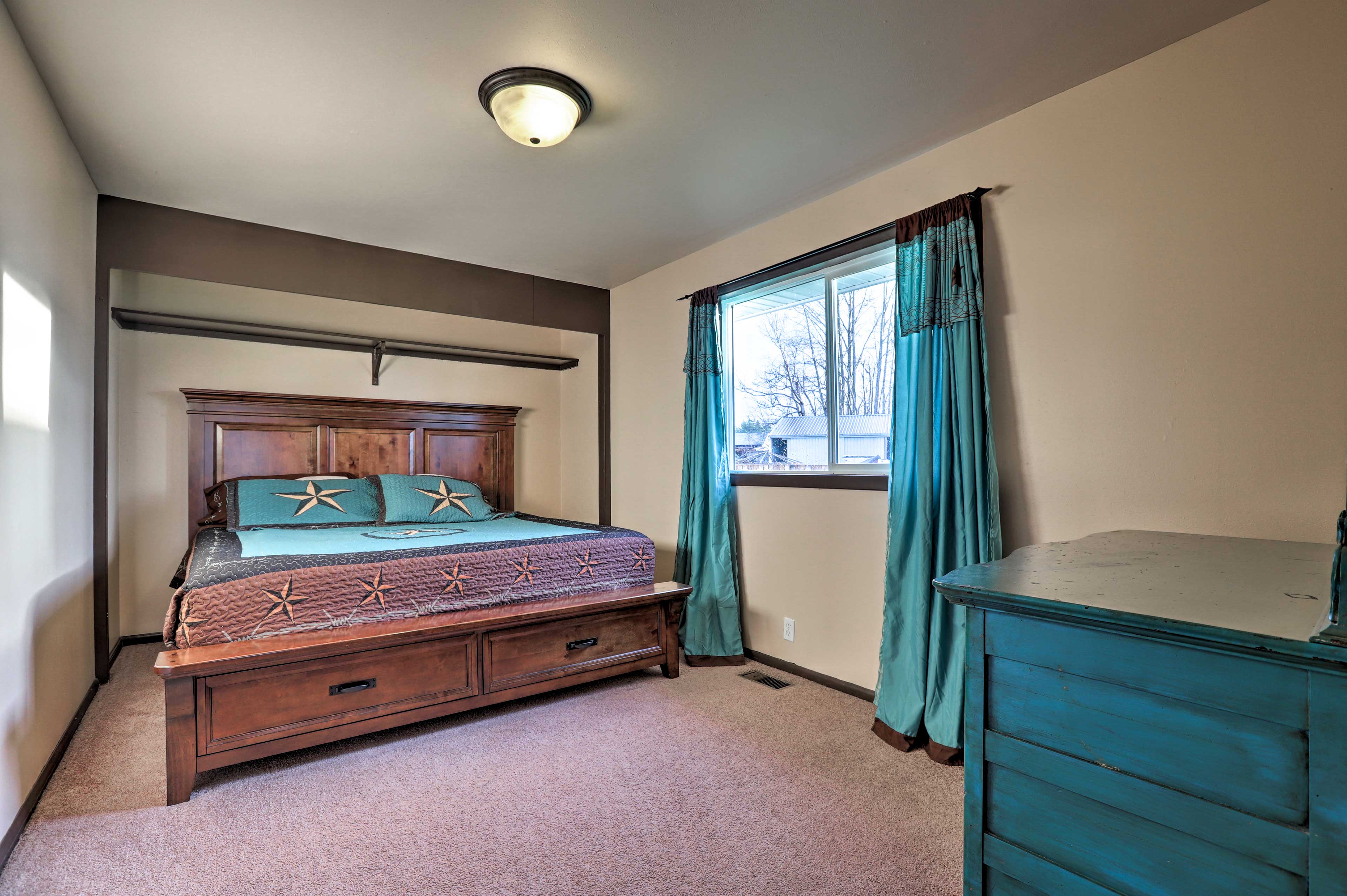 The second bedroom offers a king bed.