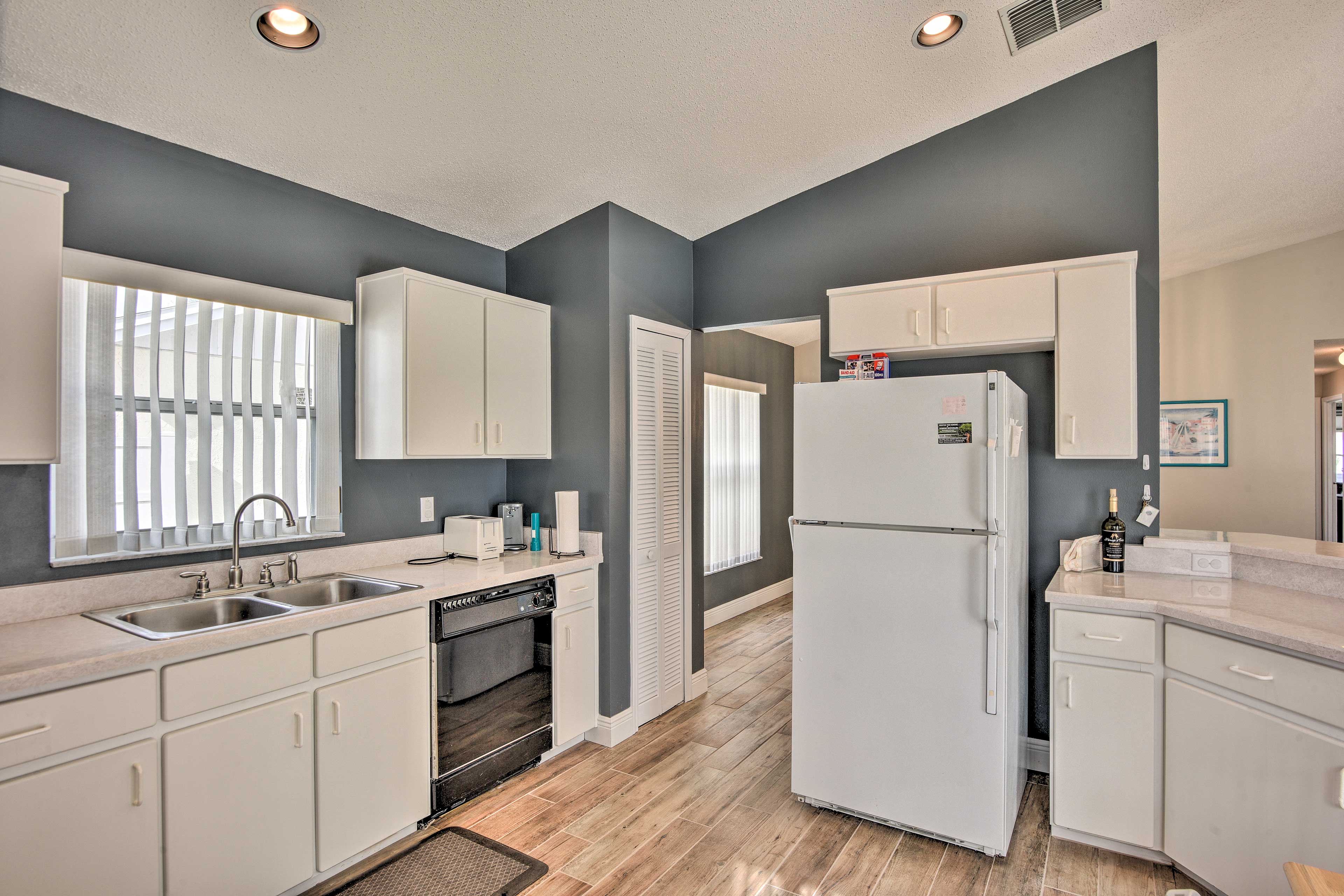 Recessed lighting brightens the kitchen.