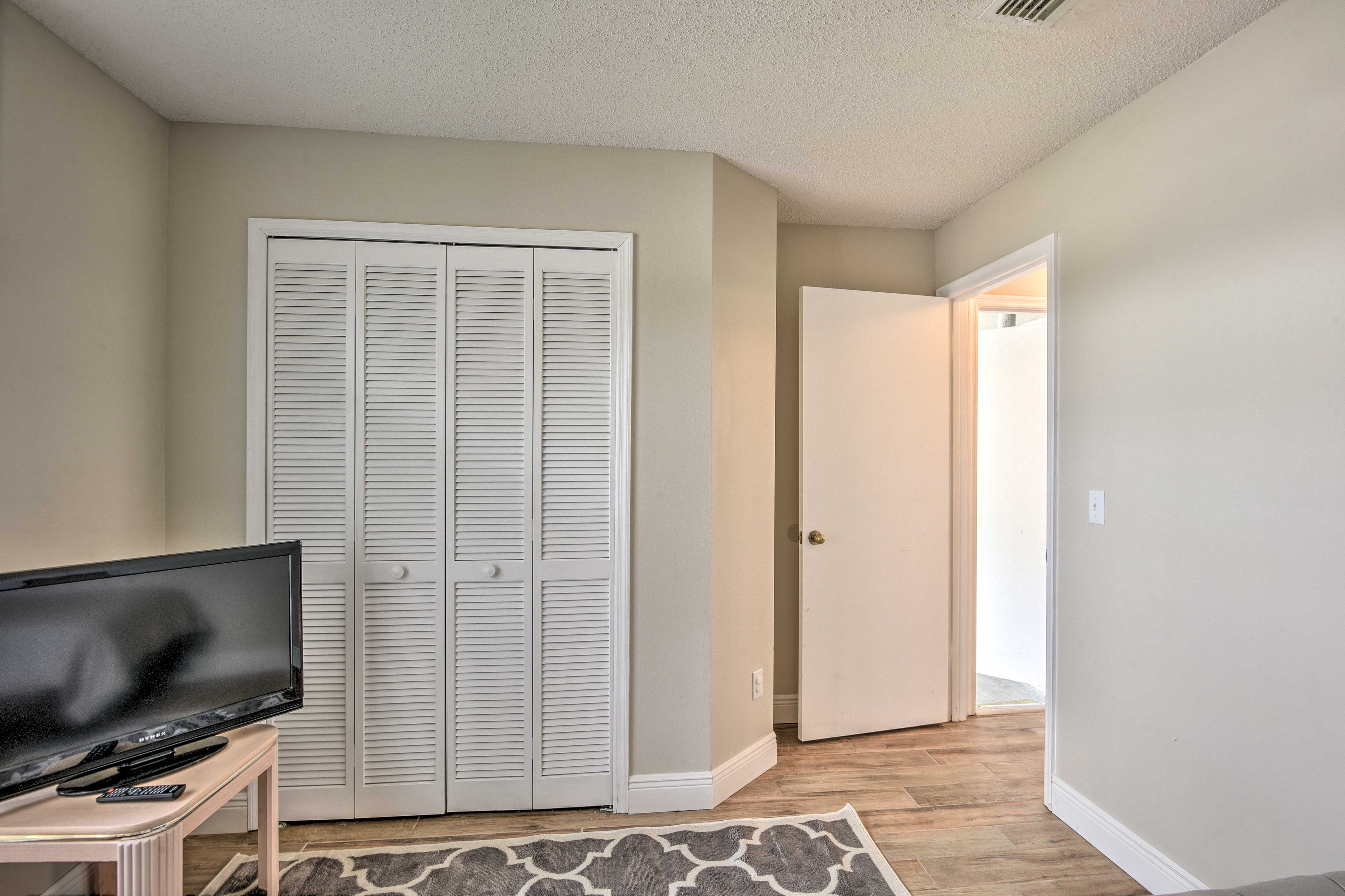 This bright bedroom also boasts a flat-screen cable TV.