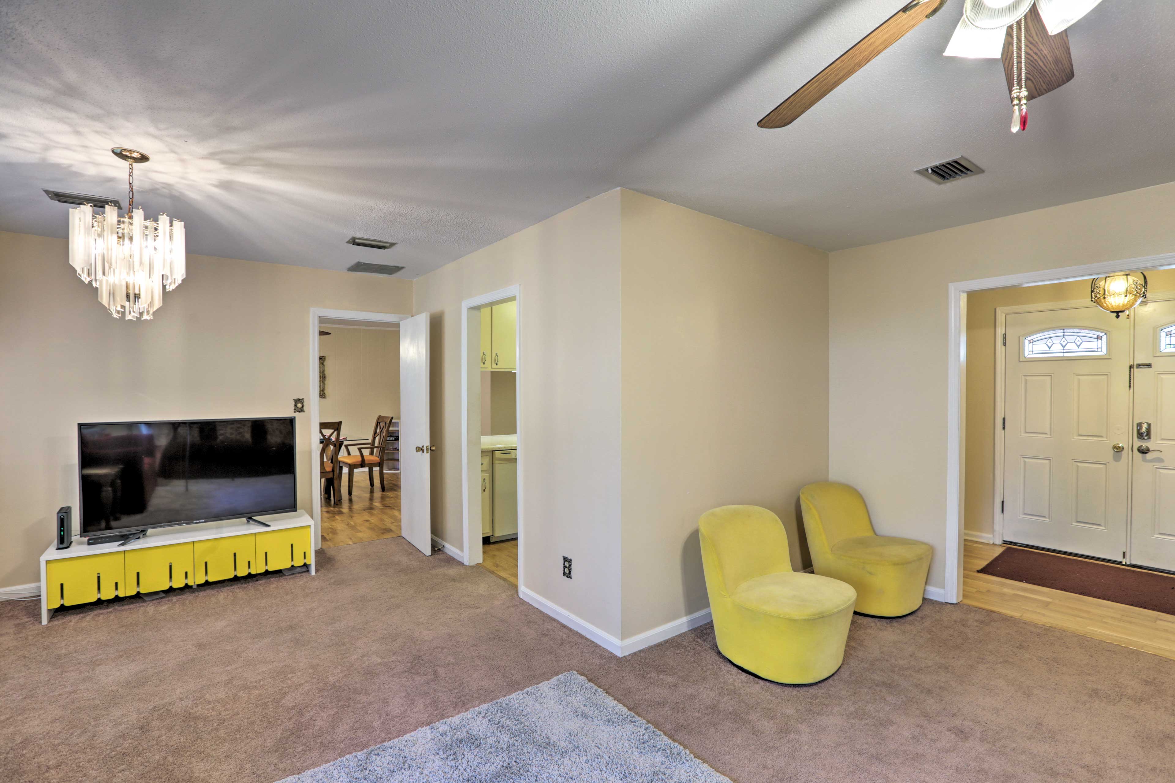 Relax on plush, modern furniture while watching movies on the flat-screen TV.