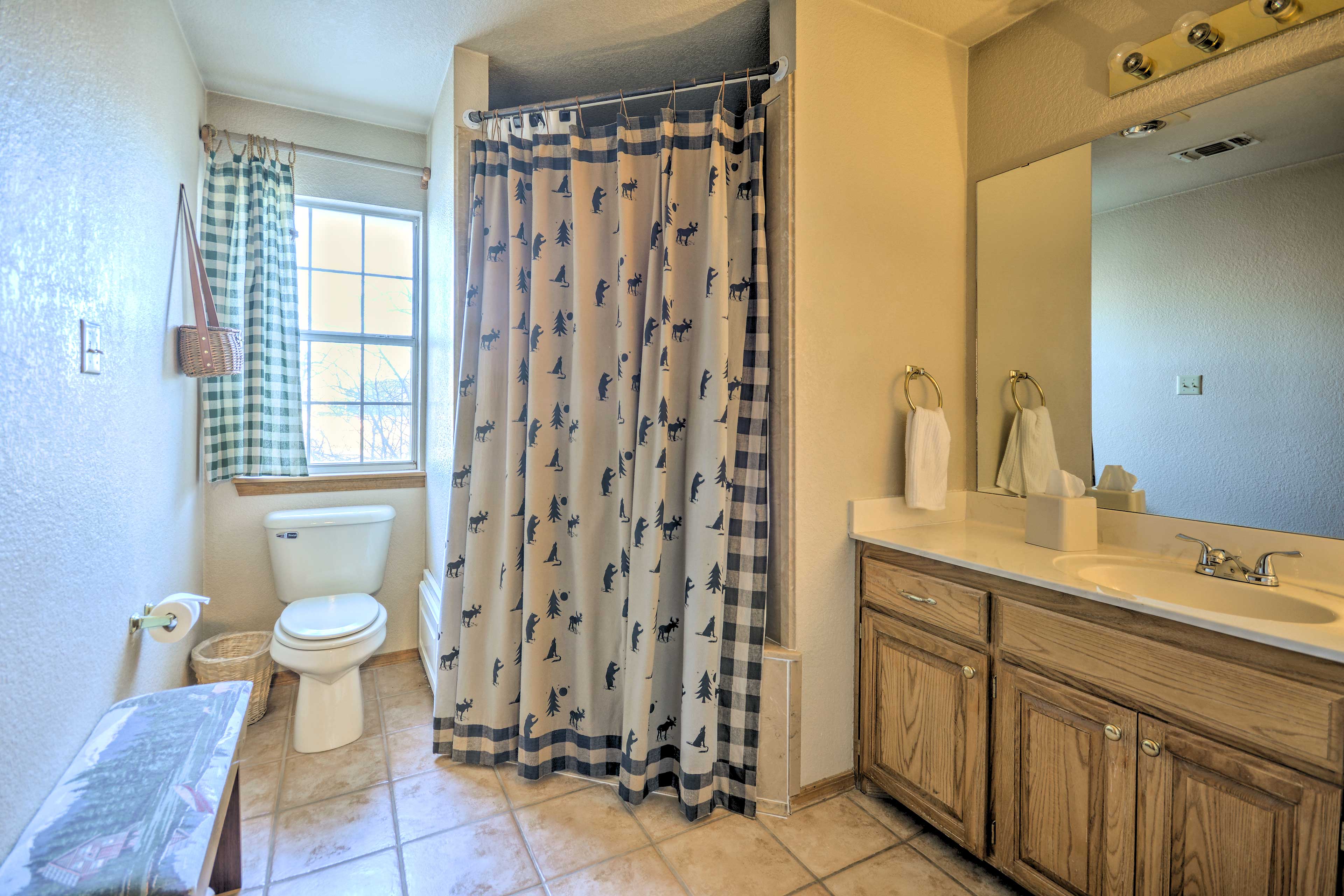 The large bathroom has a soaking tub.