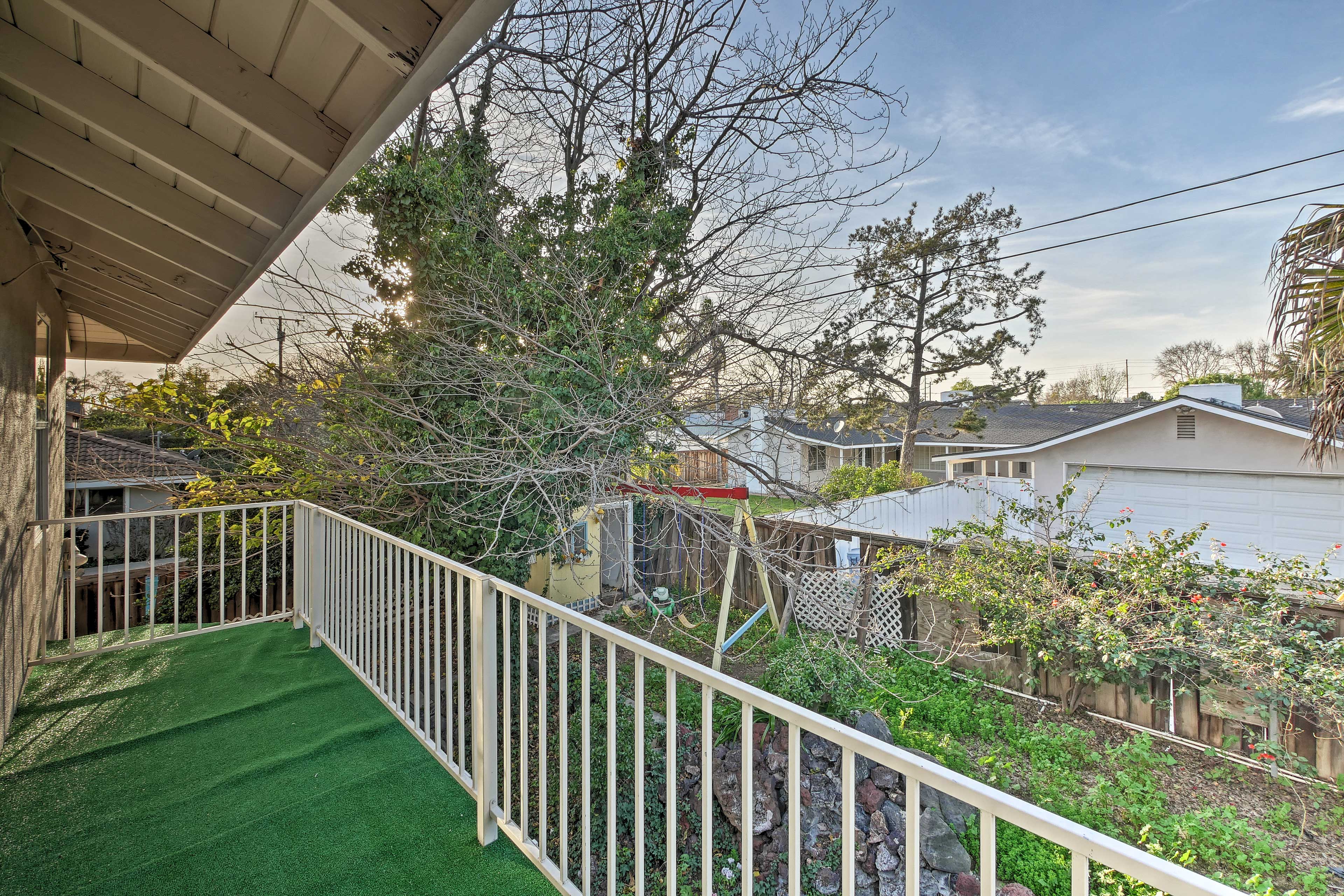 Sip your morning coffee on the balcony overlooking the yard below.