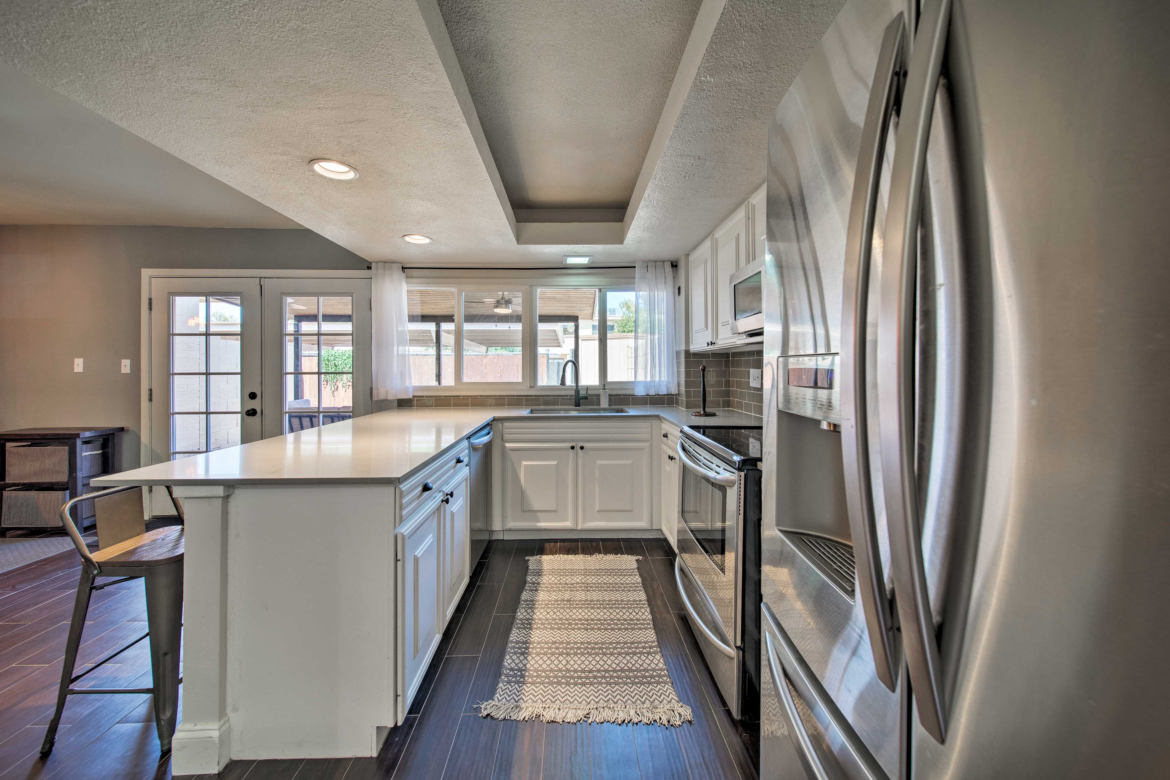 Try out a new recipe in the full kitchen with stainless steel appliances.