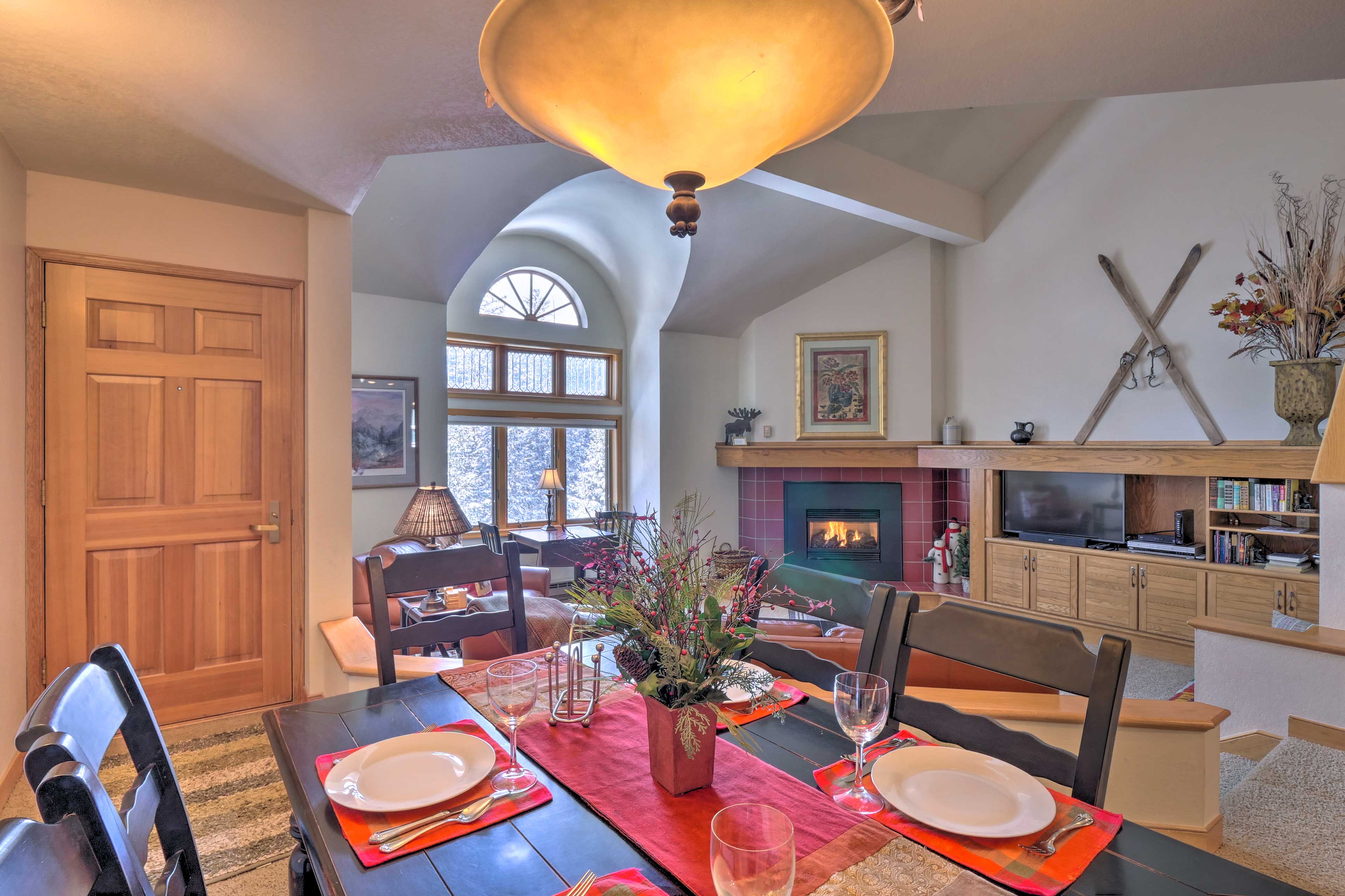 Gather the group for a family dinner around the elegant dining table.