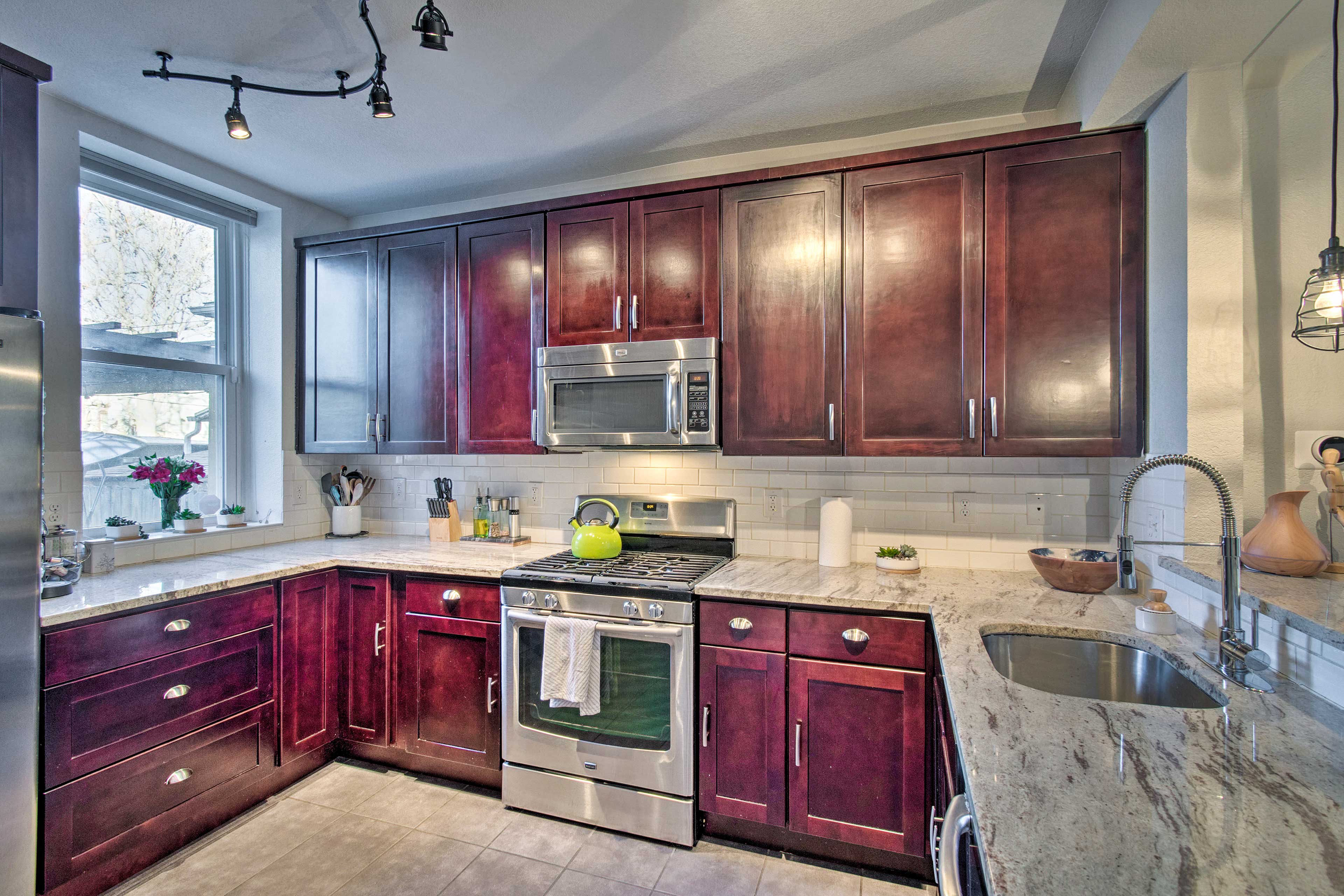 Stainless steel appliances elevate this kitchen.