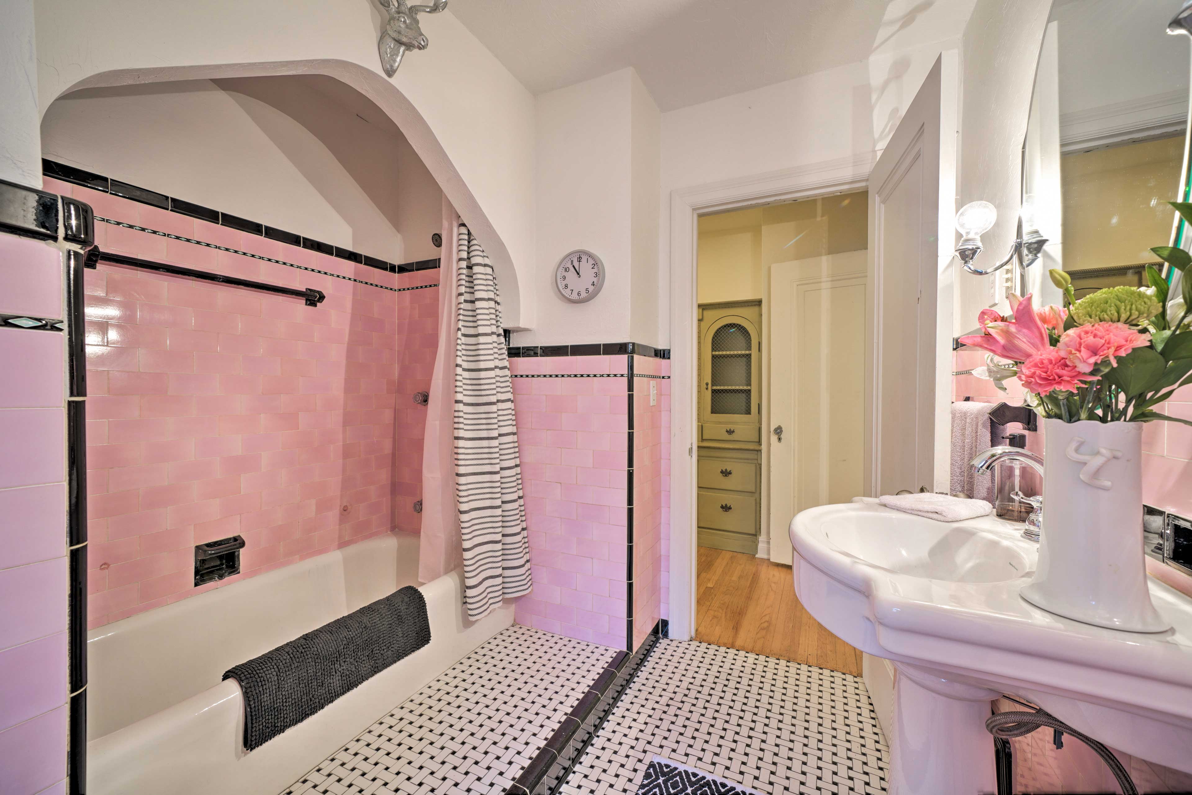 The bathroom includes a shower/tub combo.