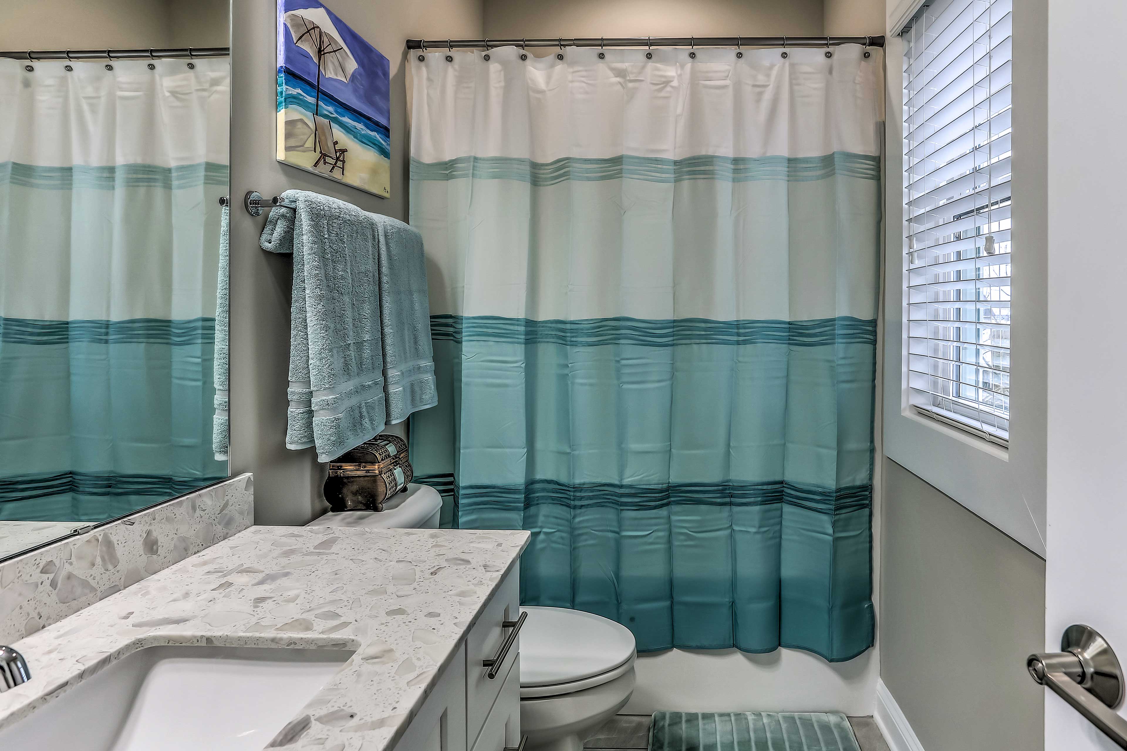 Wash the sand from your toes in this bathroom.