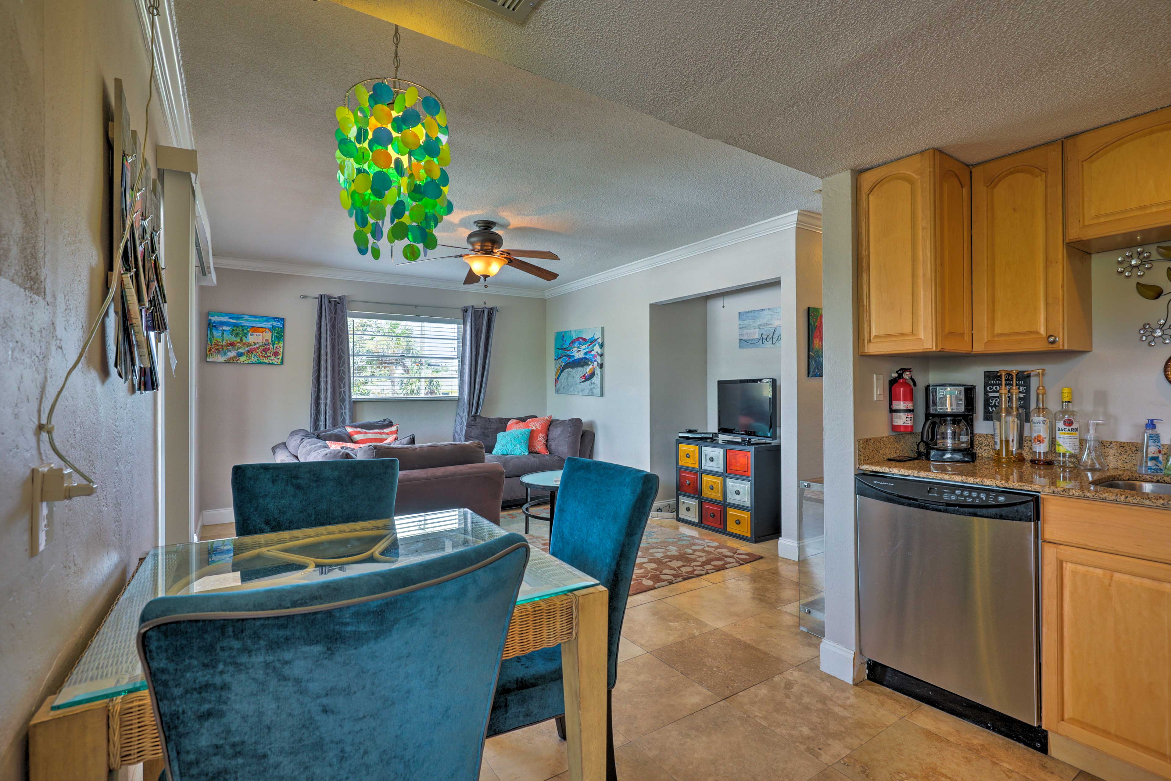 Natural light and coastal decor welcome you inside the condo.