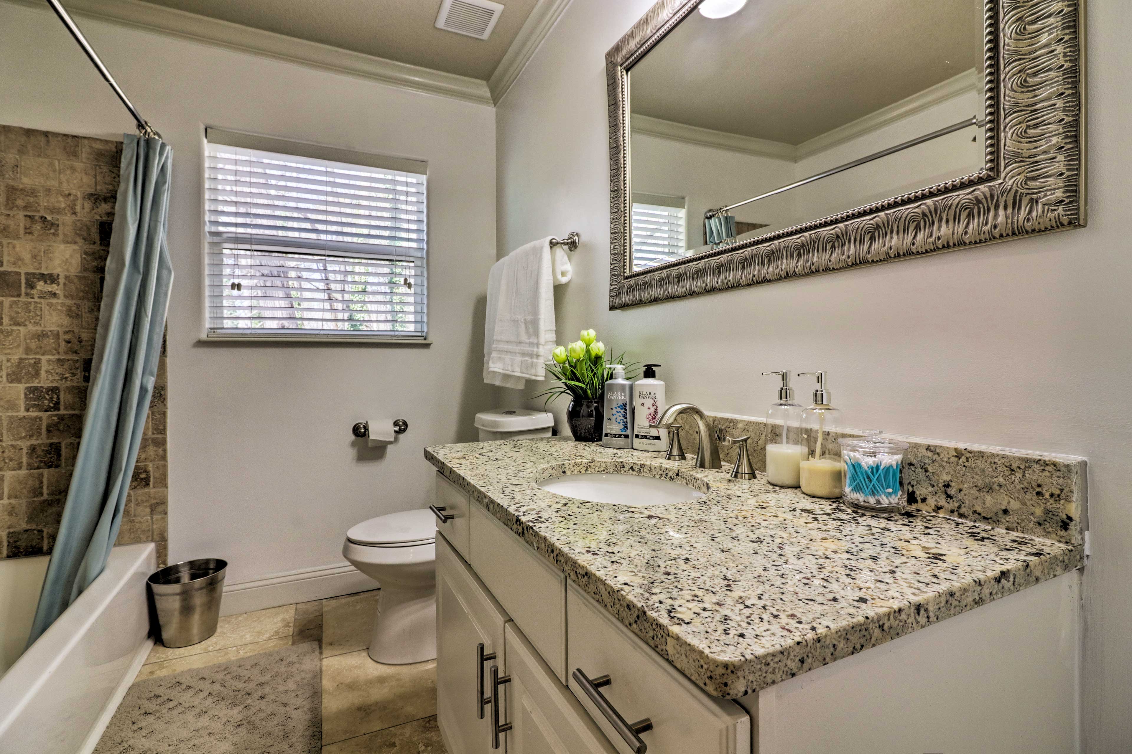 All of the bathrooms feature sleek granite countertops.