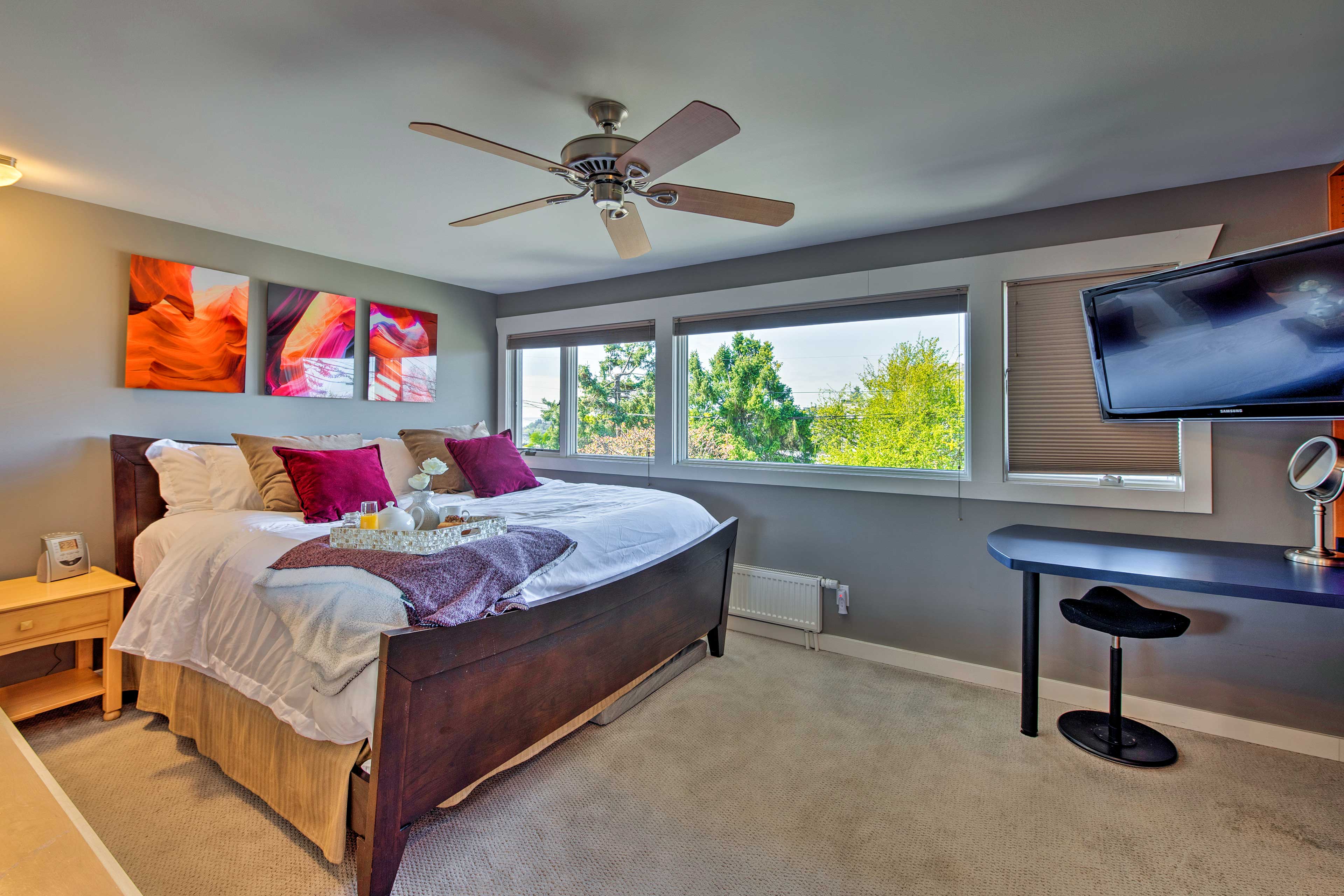 The room features a king bed and flat-screen Smart TV.