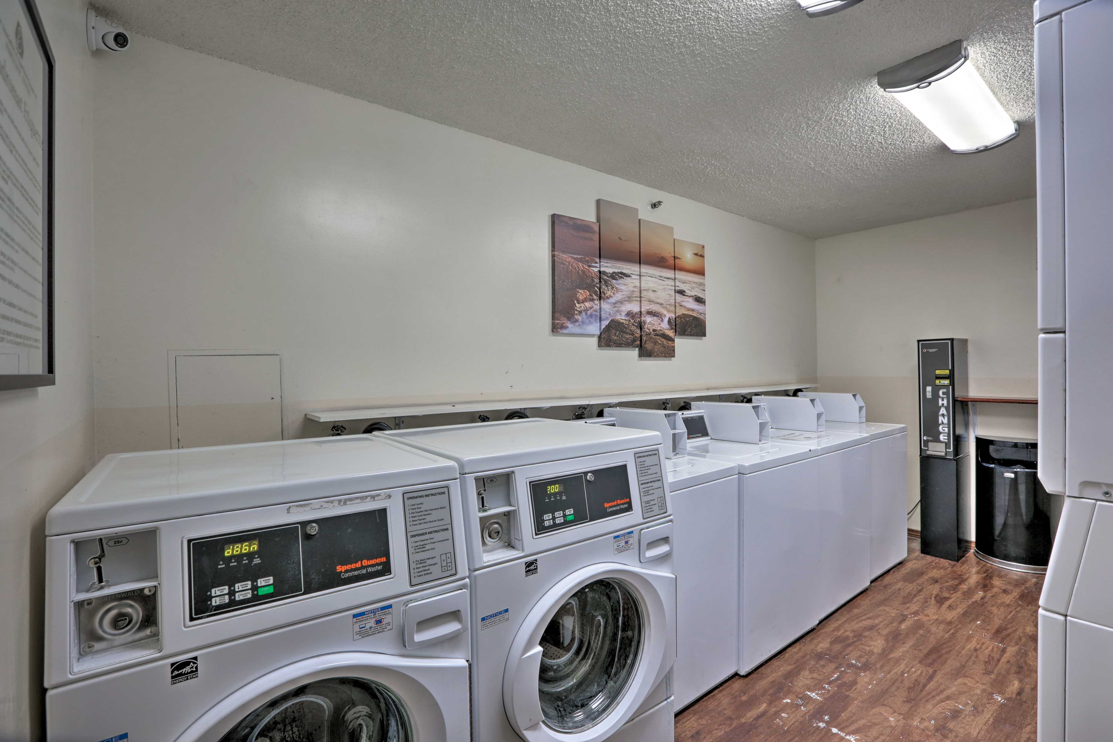 There are coin-operated laundry machines available.