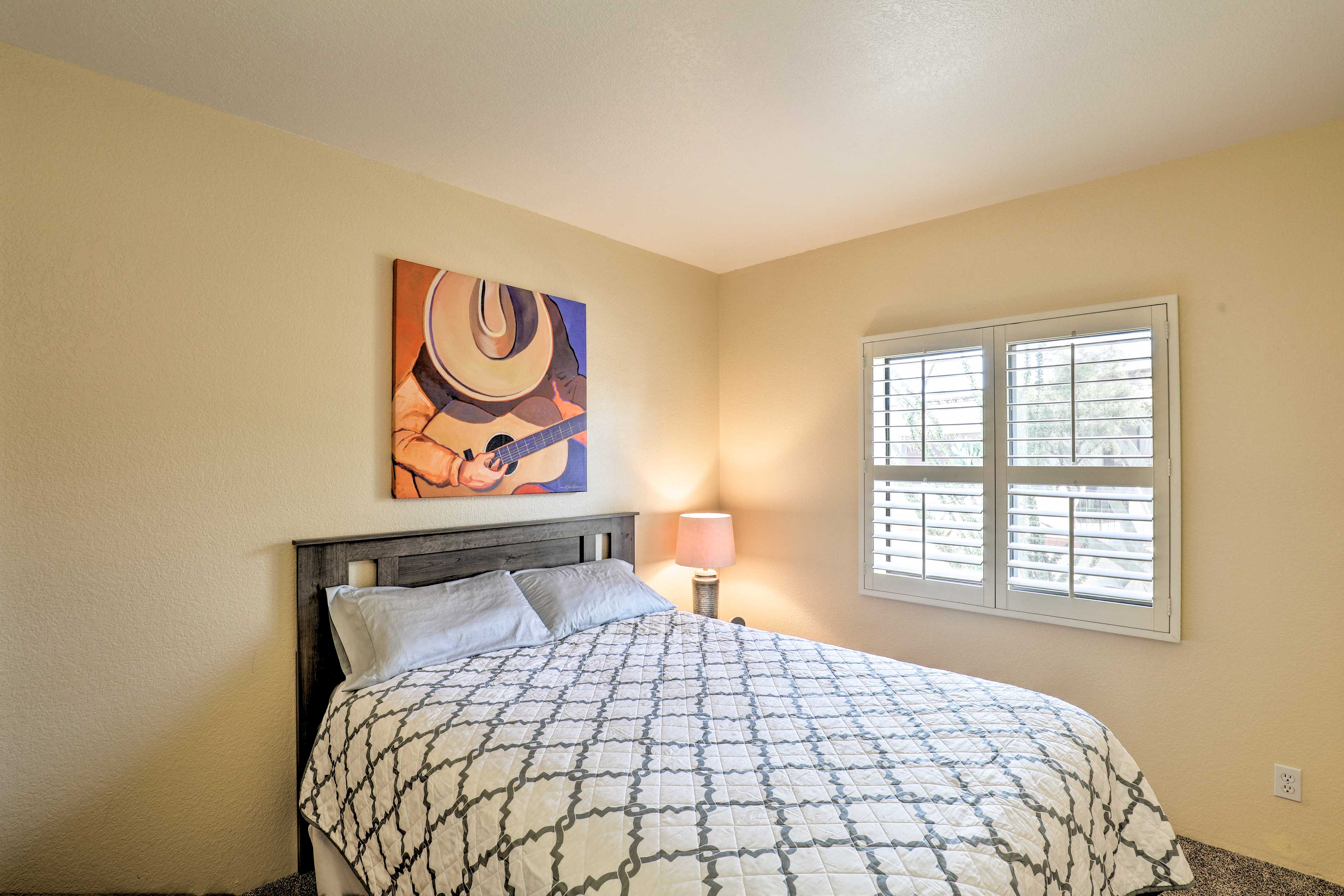 The second bedroom offers a queen-sized bed.