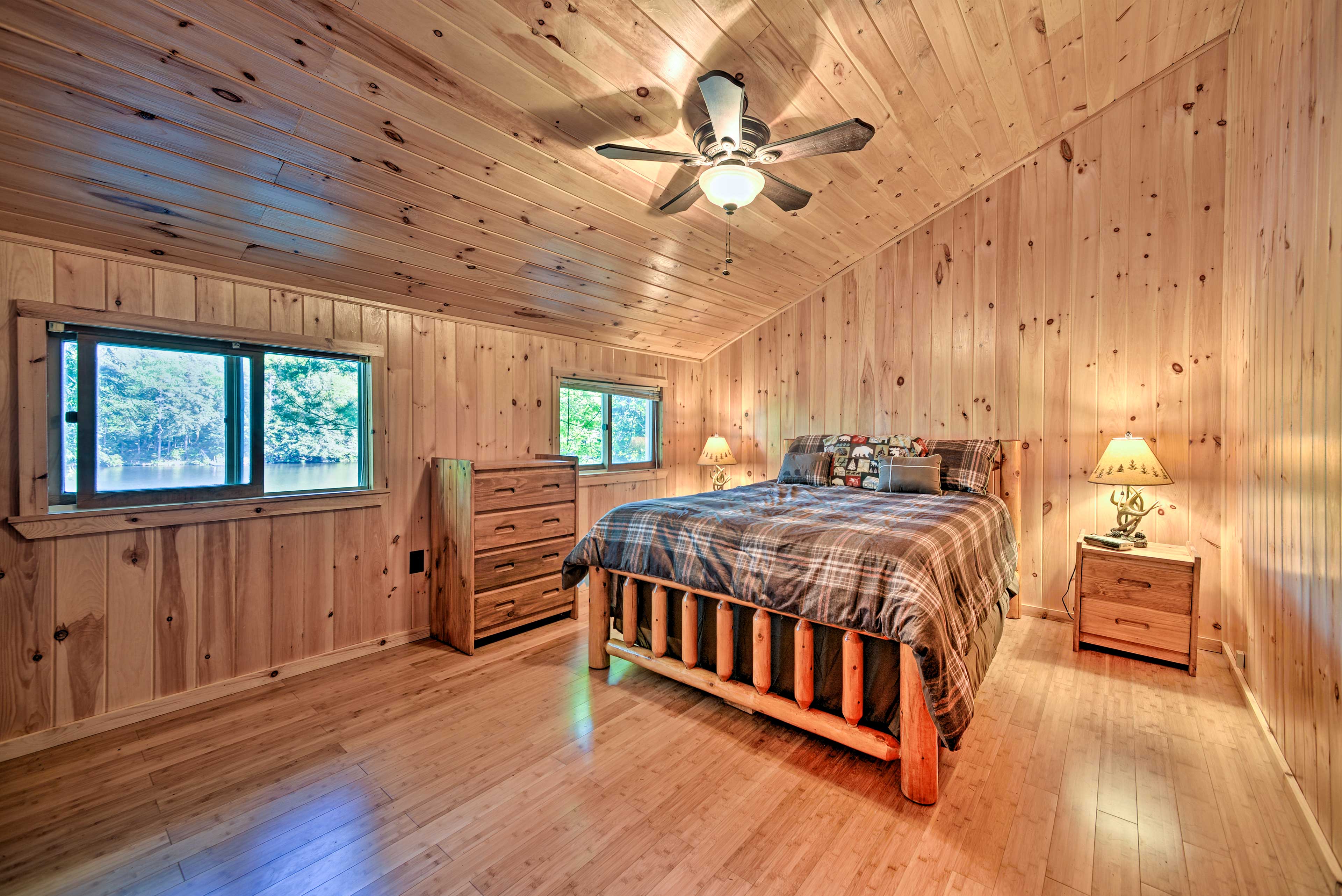 In the first bedroom, the queen bed and windows offer a breeze sleeping spot.