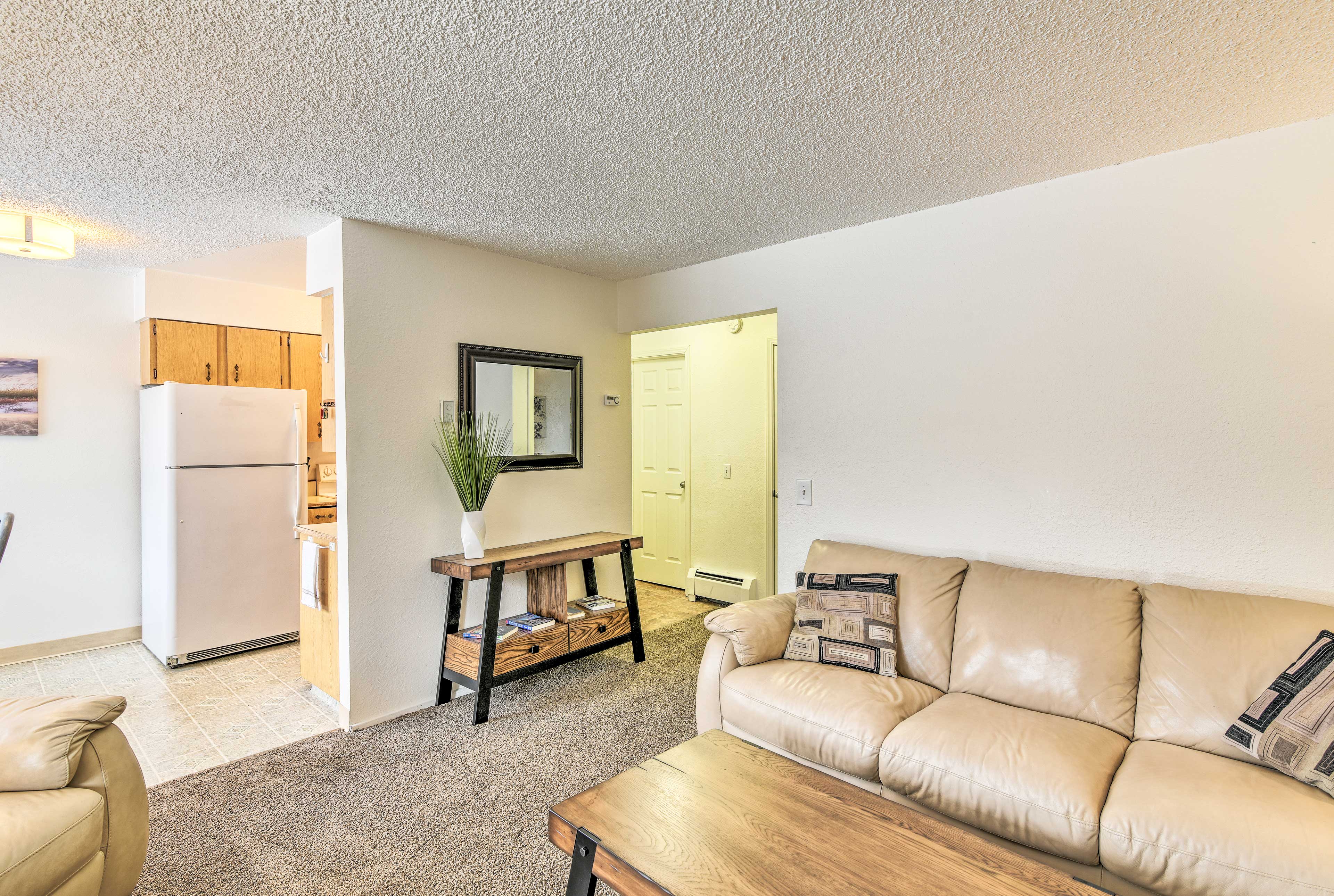 The living room opens to the kitchen and breakfast nook.