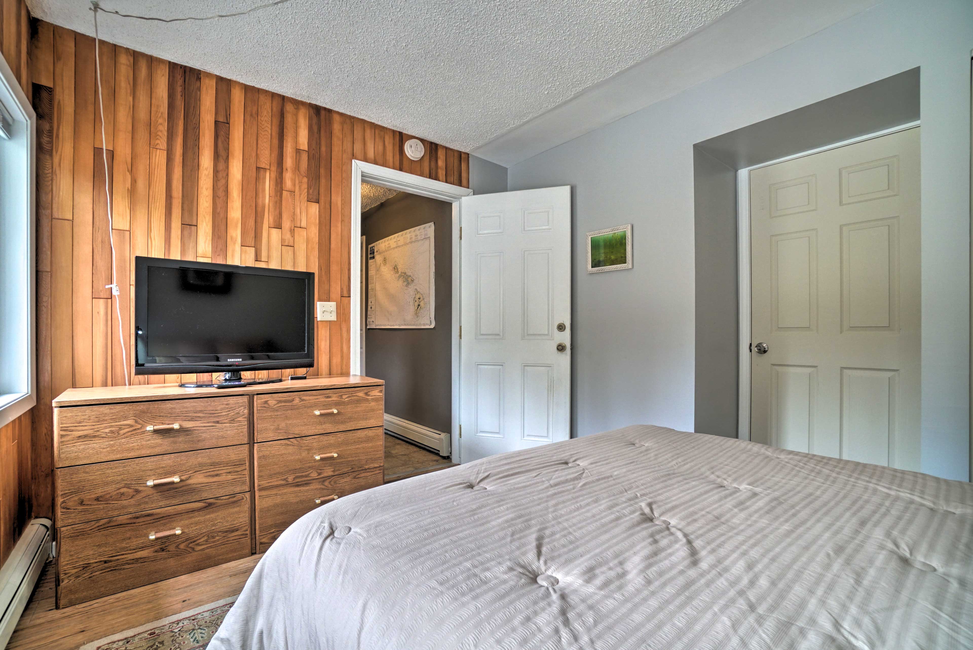 The shiplap wall gives the room a unique charm.