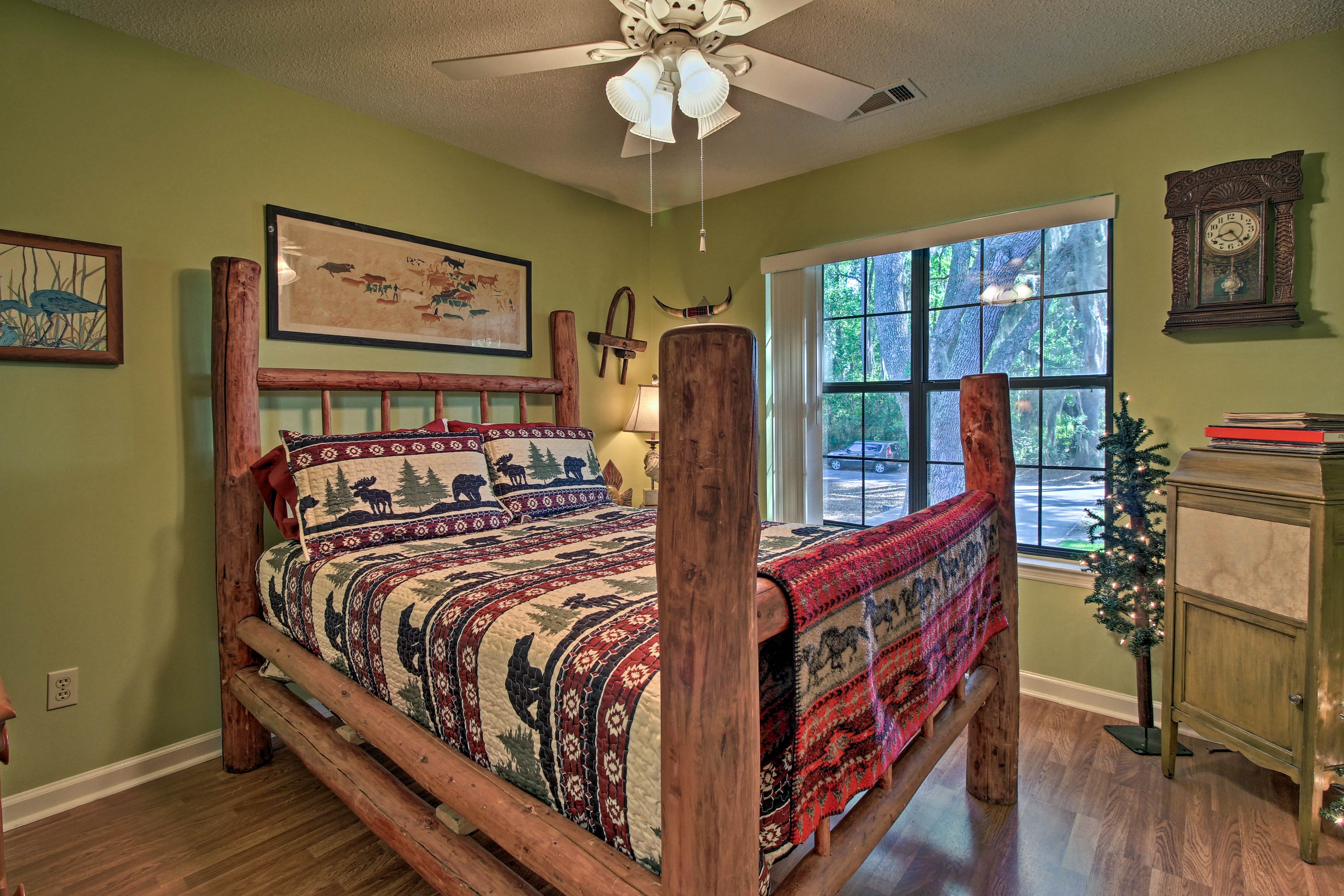 This bedroom includes a full-sized bed.