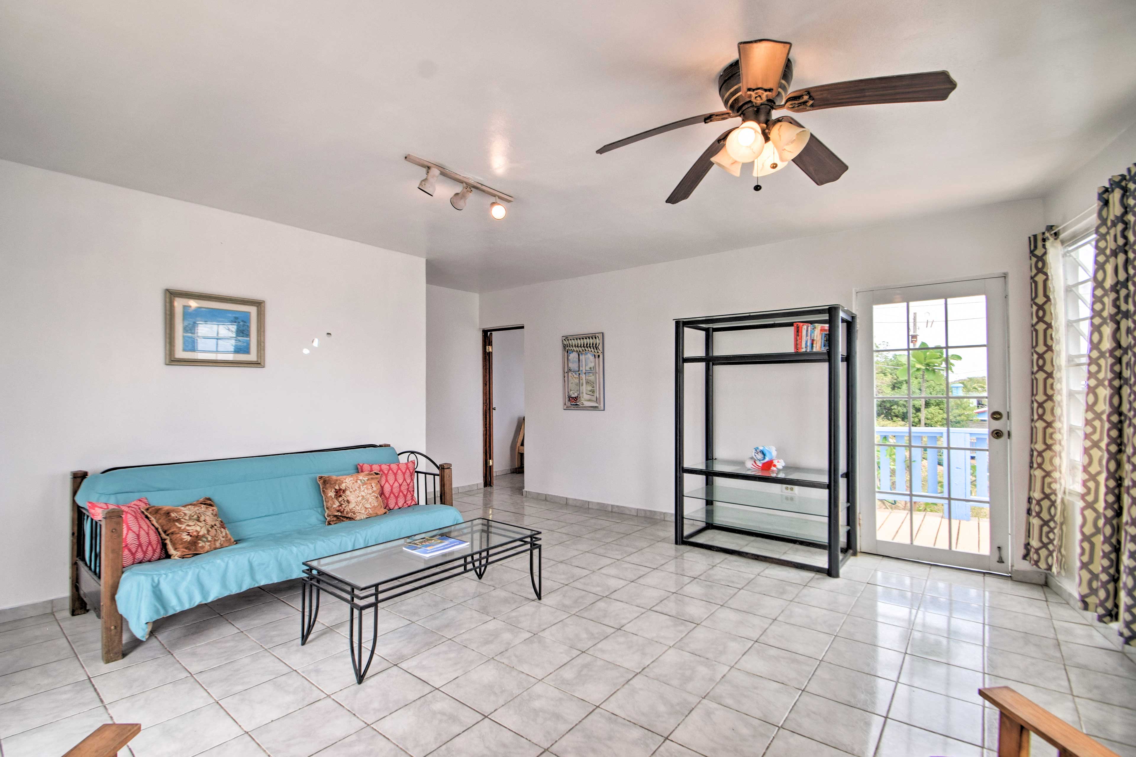 Step through the patio door right out to the water-view balcony.