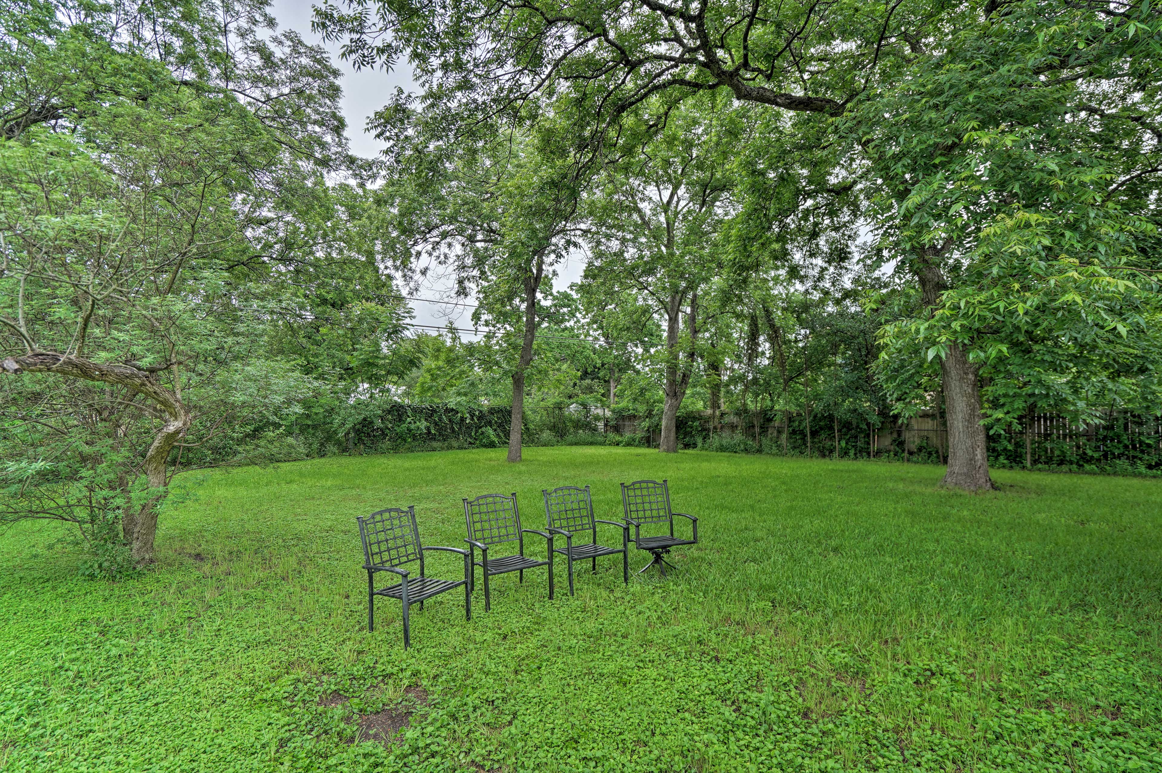 The vacation rental property includes a spacious & secluded yard.