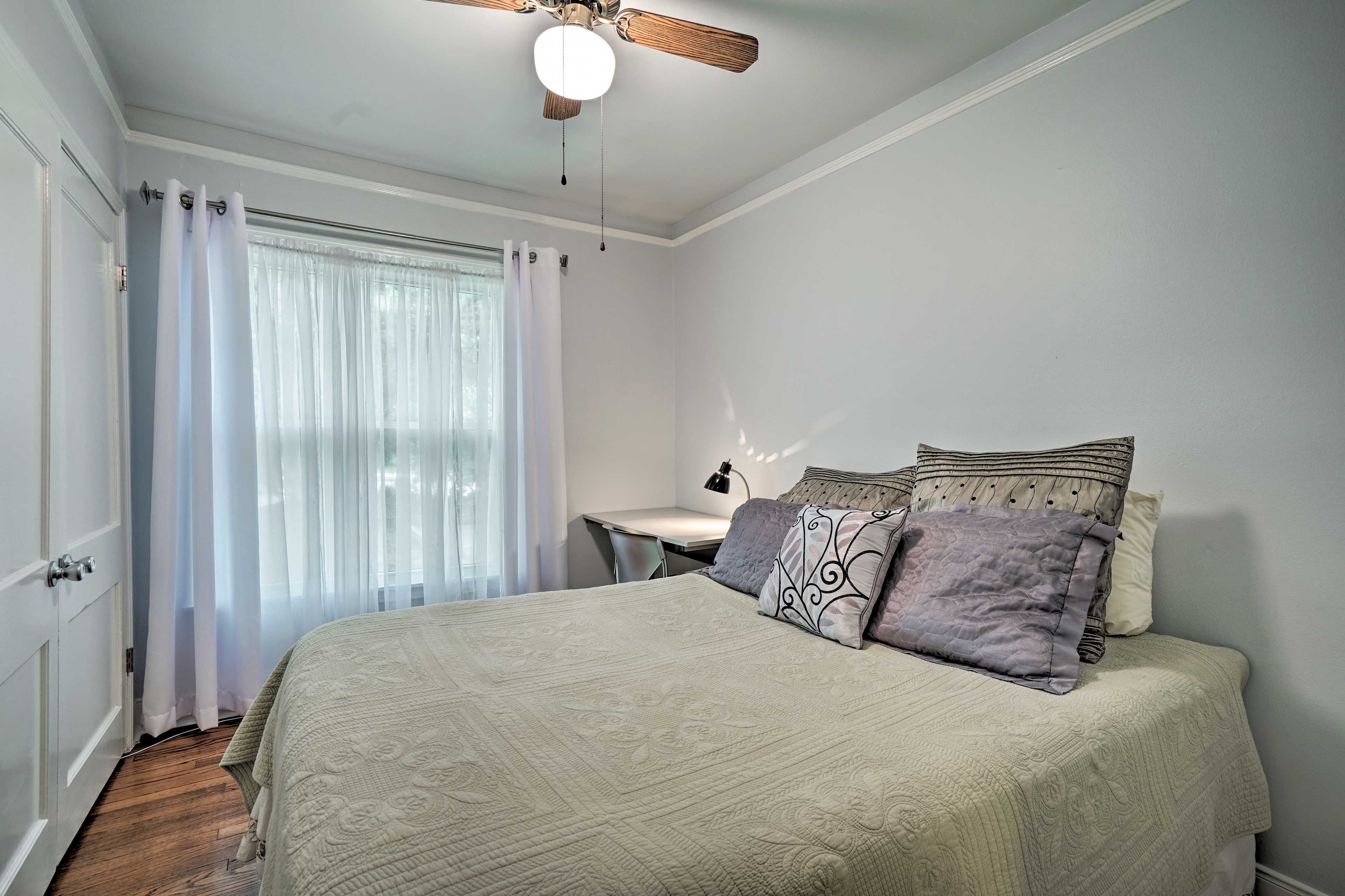 The second bedroom hosts a queen bed.