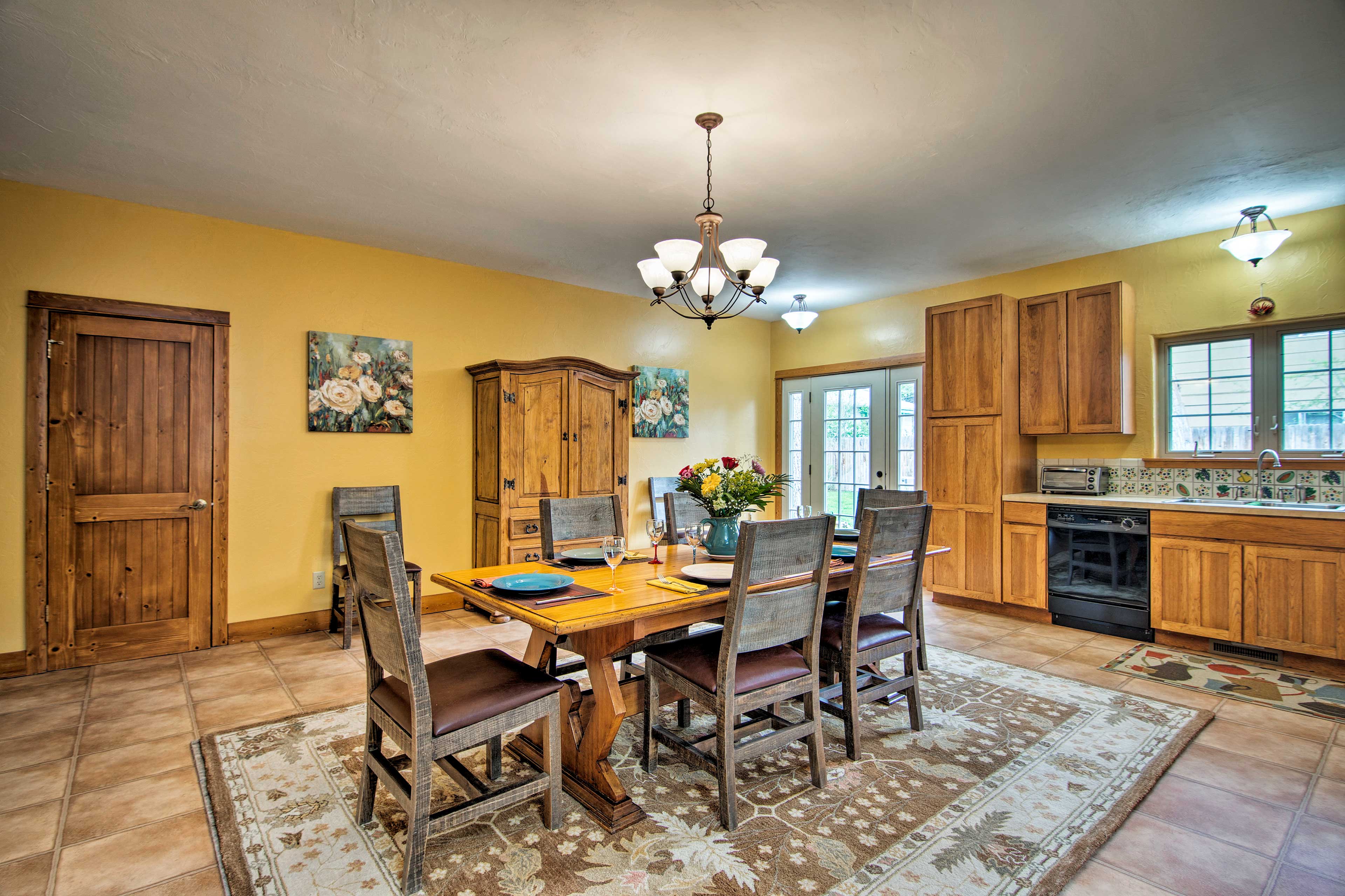 Enjoy meals together at the 6-person dining table.