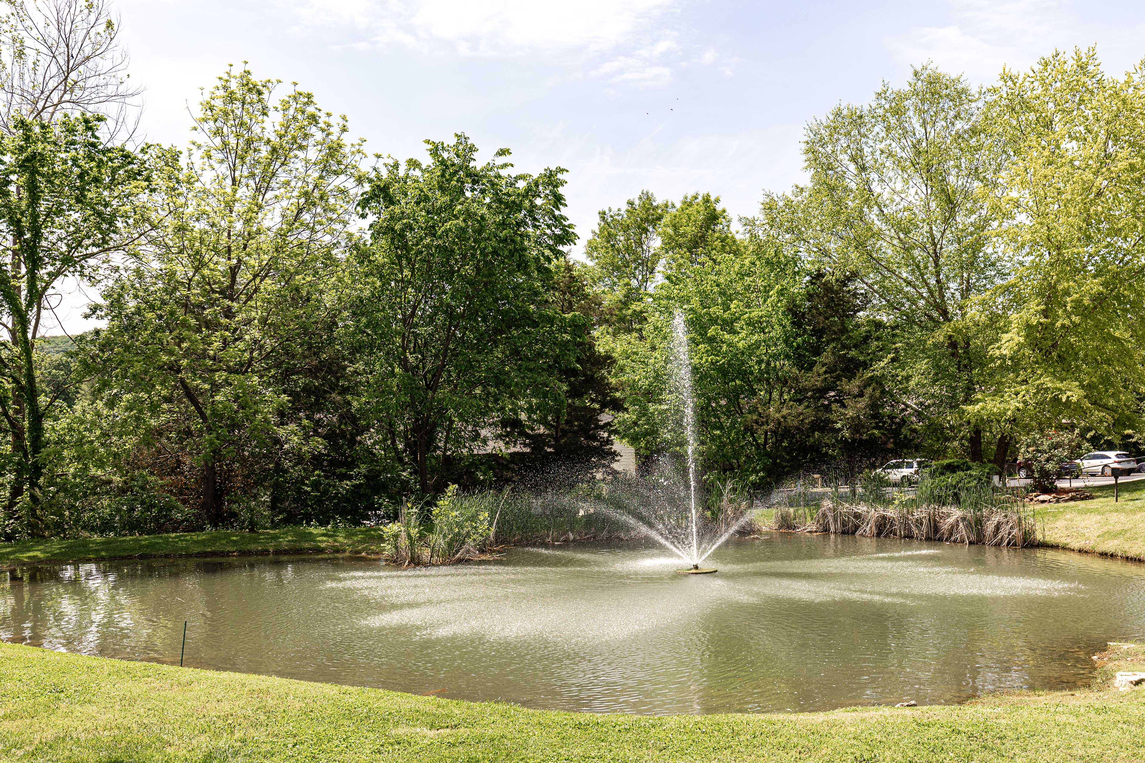 You'll love the views of the pond with a fountain.