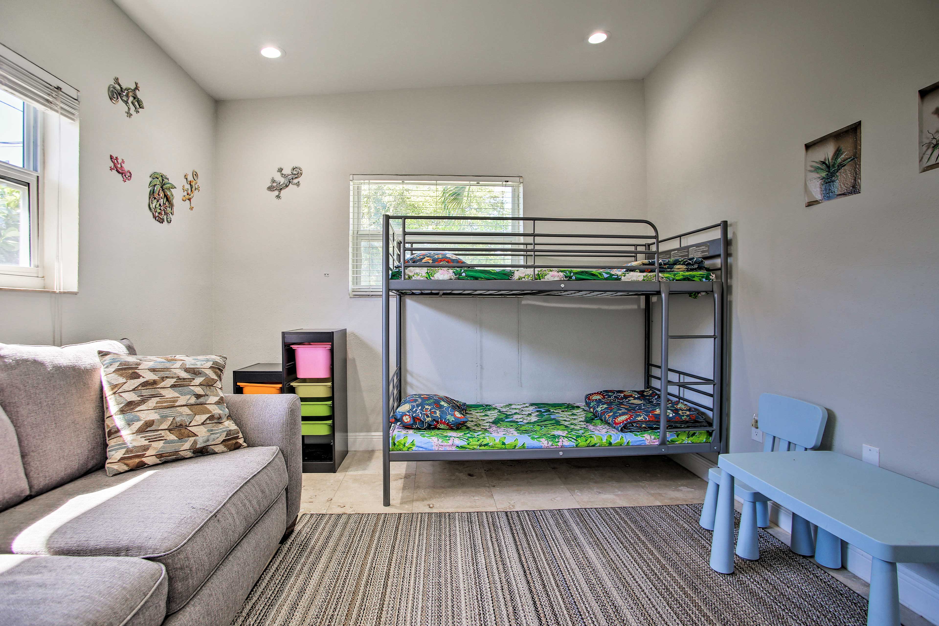 This room is outfitted with a twin bunk bed and sleeper sofa.